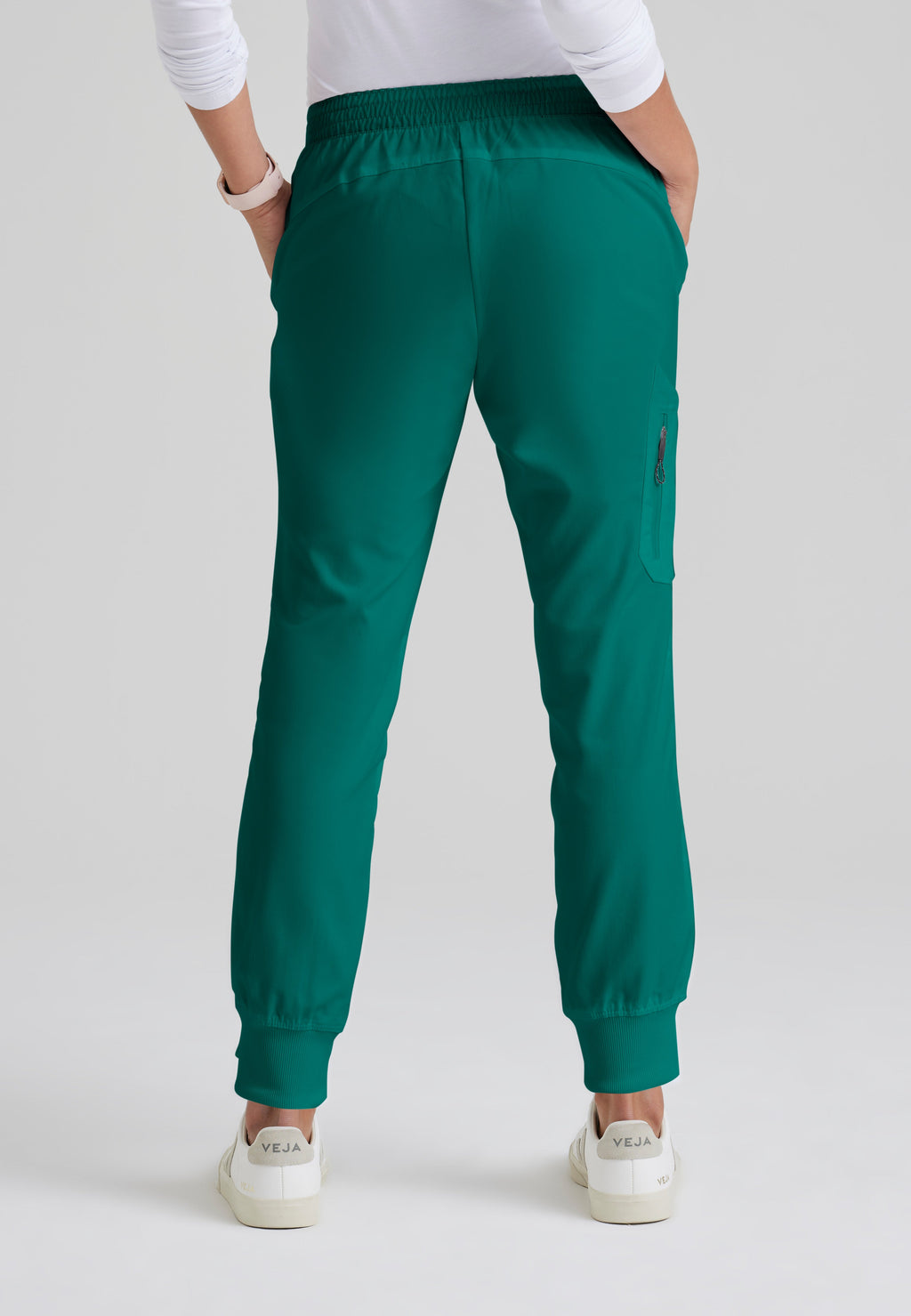 Back View of the Kira 5-Pocket Mid-Rise Jogger Scrub Pant in Hunter Green from Grey's Anatomy™ by Barco Classic