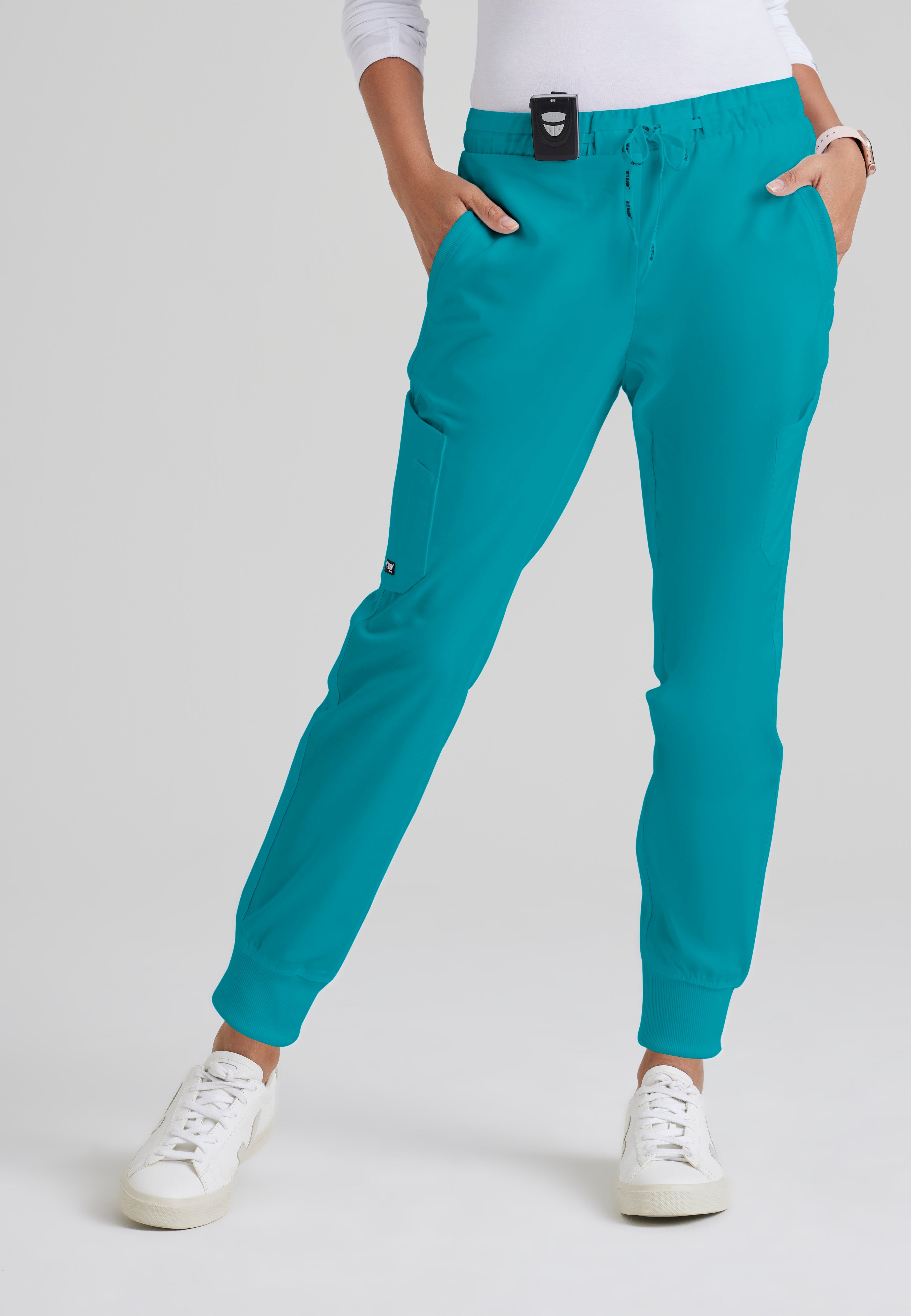 Front View of the Kira 5-Pocket Mid-Rise Jogger Scrub Pant in Teal from Grey's Anatomy™ by Barco Classic