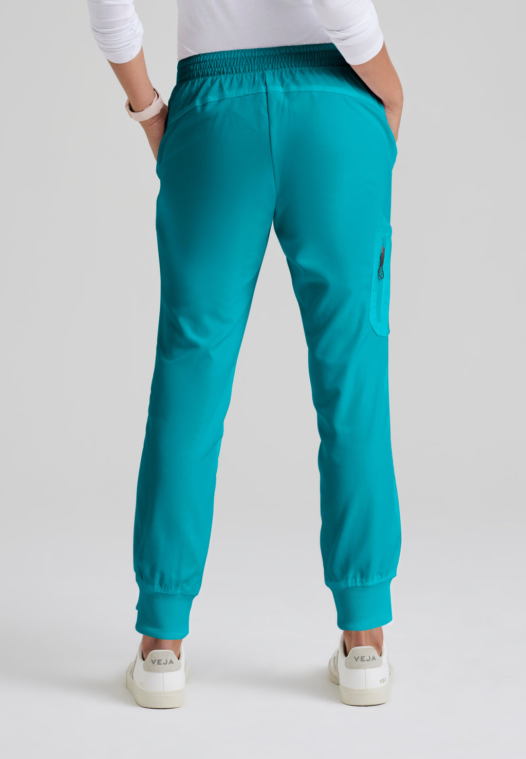 Back View of the Kira 5-Pocket Mid-Rise Jogger Scrub Pant in Teal from Grey's Anatomy™ by Barco Classic