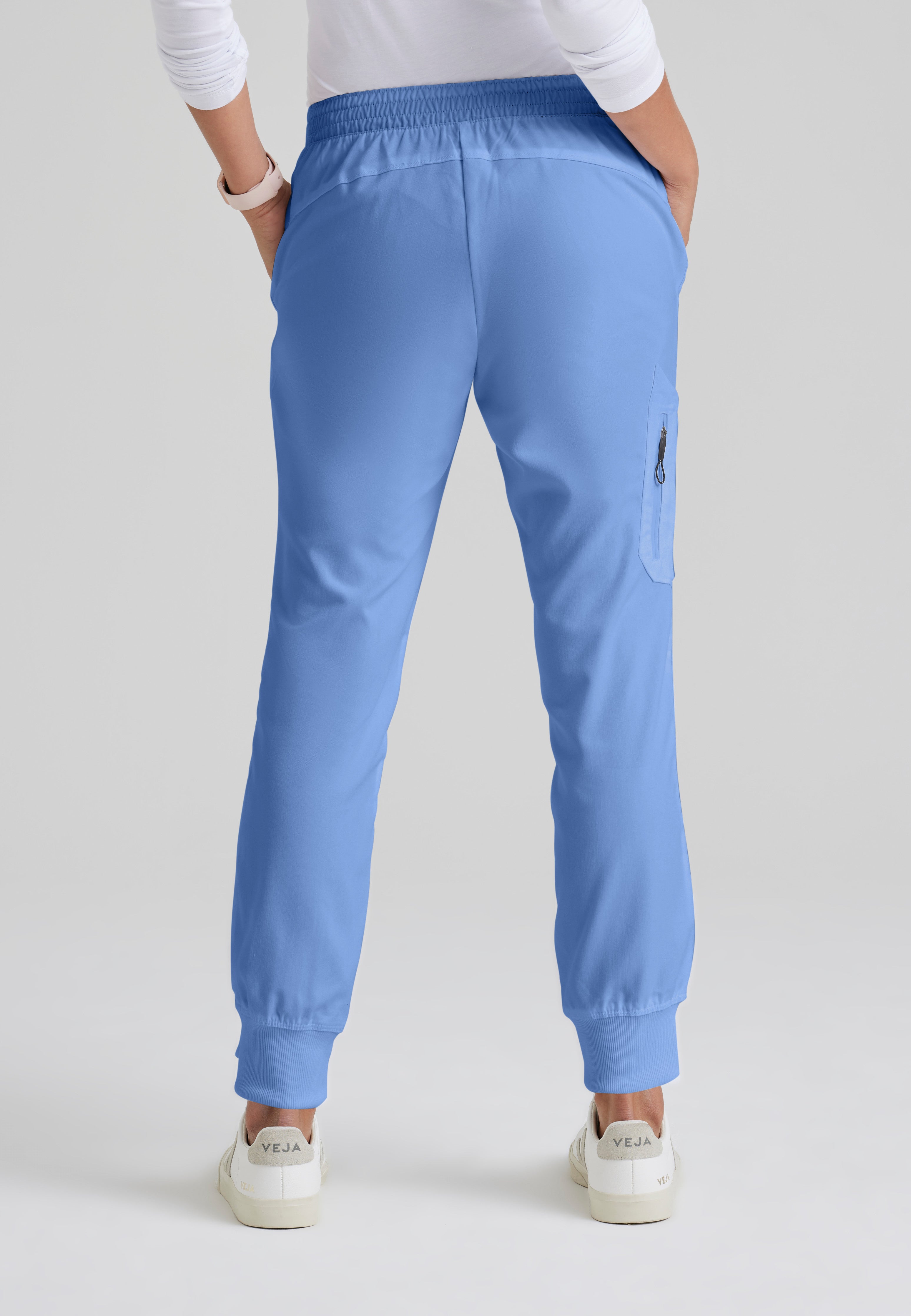 Back View of the Kira 5-Pocket Mid-Rise Jogger Scrub Pant in Ciel Blue from Grey's Anatomy™ by Barco Classic