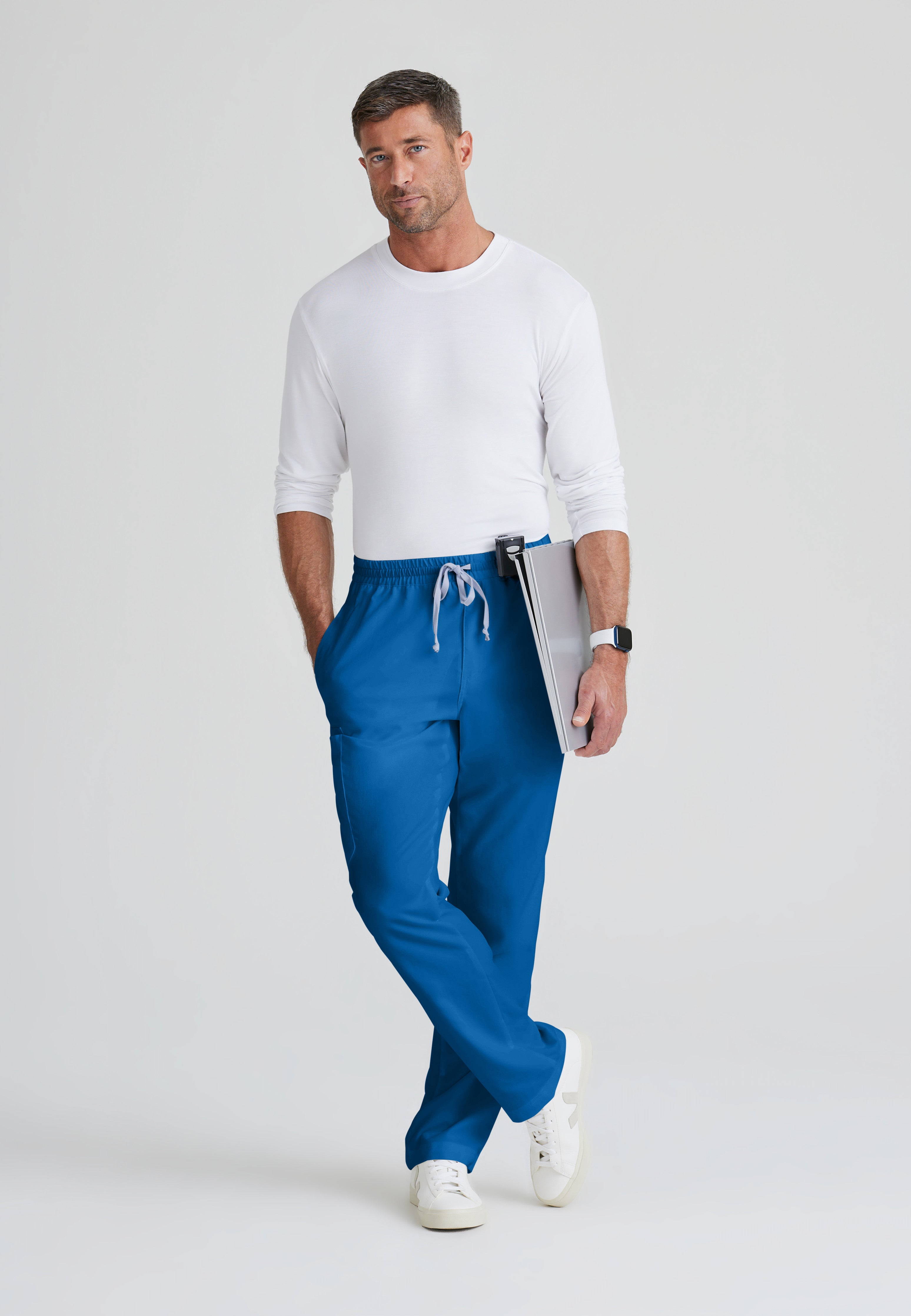 Full Body View of the Evan 5-Pocket Zip-Fly Scrub Pant in New Royal from Grey's Anatomy™ by Barco Classic