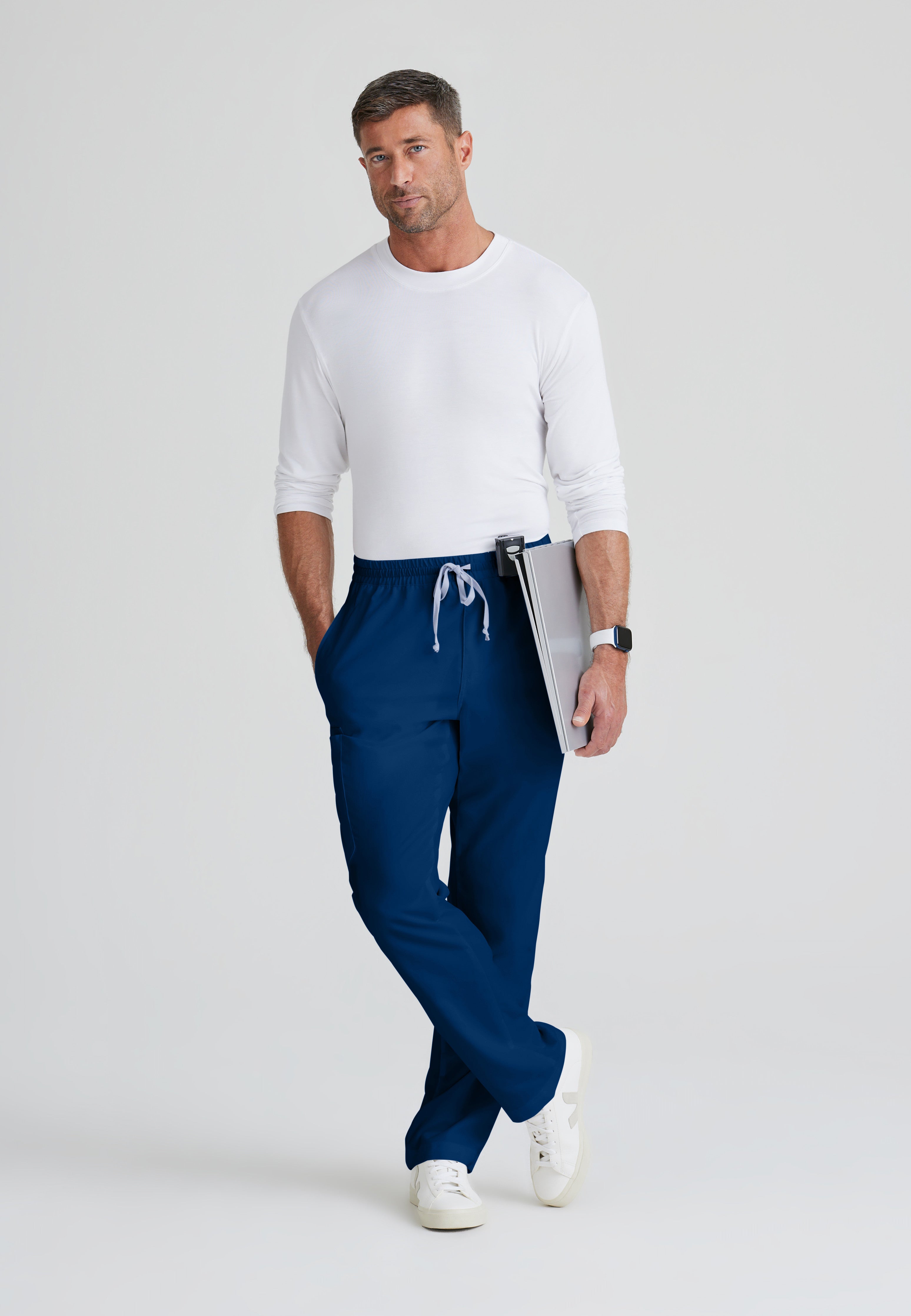 Full Body View of the Evan 5-Pocket Zip-Fly Scrub Pant in Indigo from Grey's Anatomy™ by Barco Classic