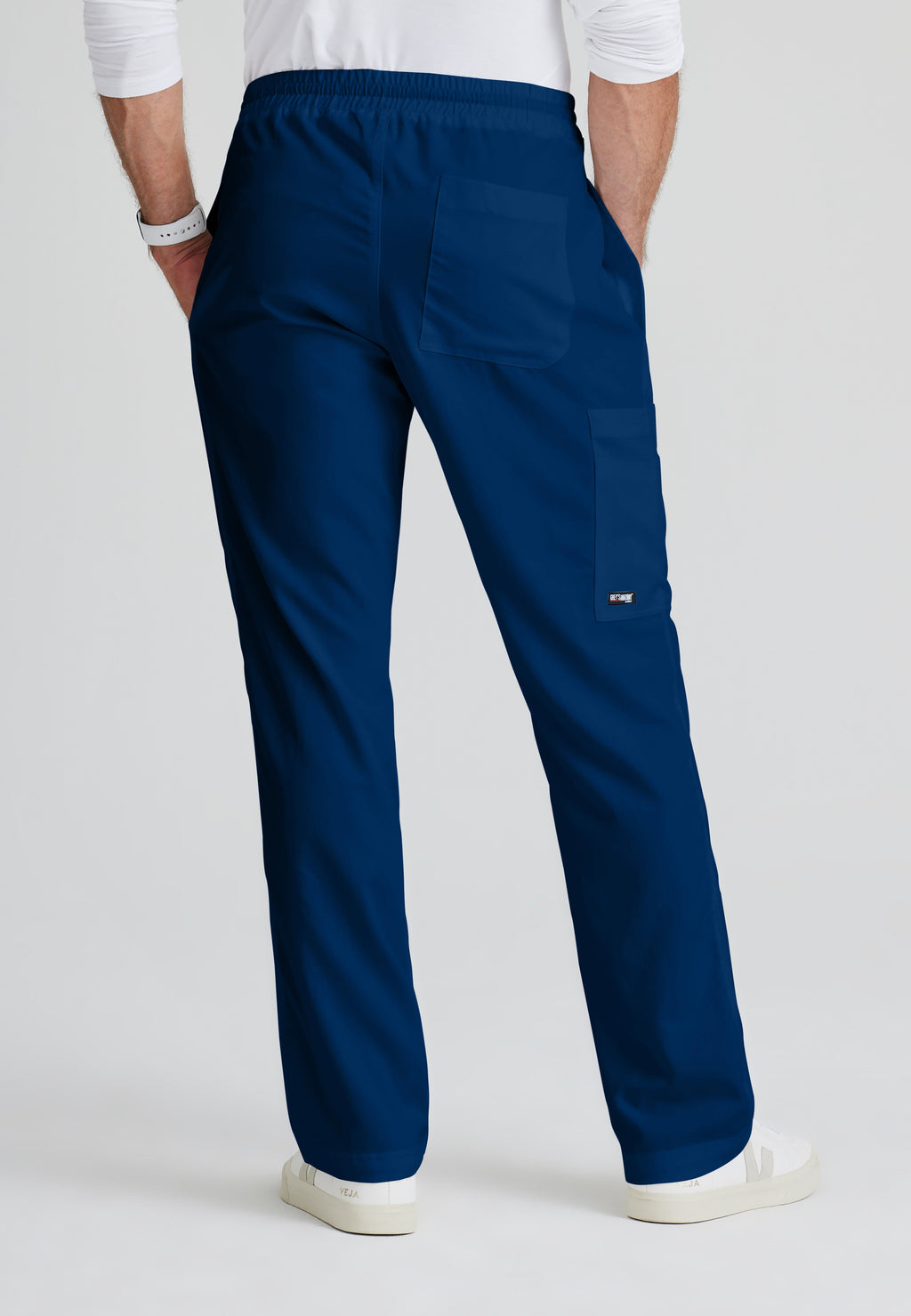 Back View of the Evan 5-Pocket Zip-Fly Scrub Pant in Indigo from Grey's Anatomy™ by Barco Classic