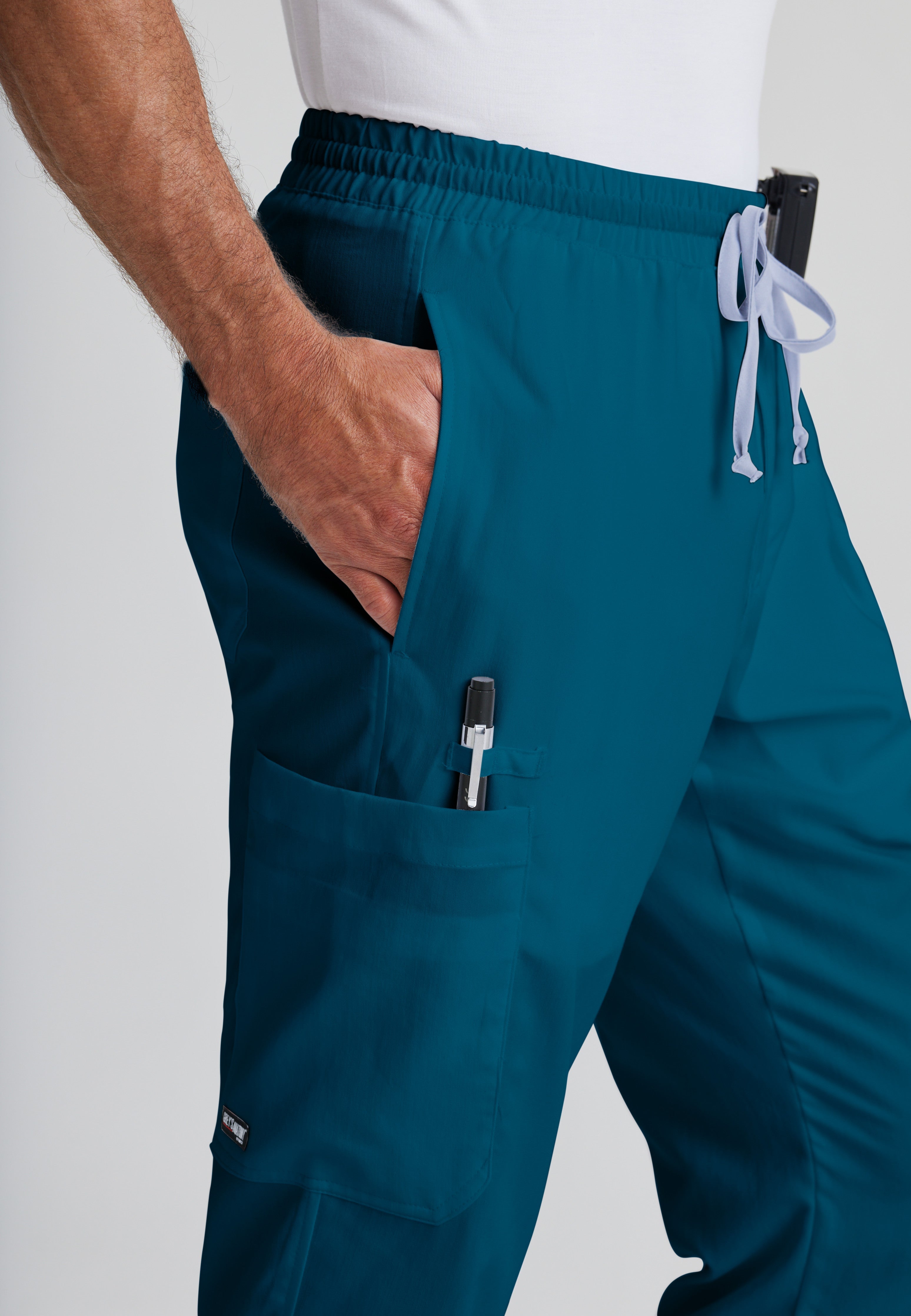 Detail Shot of the Evan 5-Pocket Zip-Fly Scrub Pant in Bahama from Grey's Anatomy™ by Barco Classic