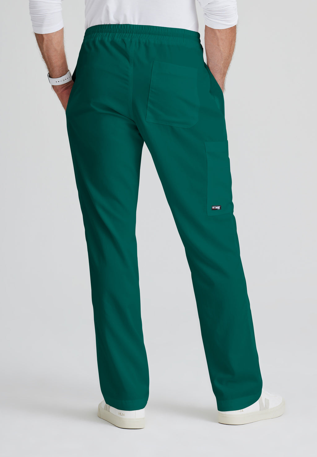 Back View of the Evan 5-Pocket Zip-Fly Scrub Pant in Hunter Green from Grey's Anatomy™ by Barco Classic