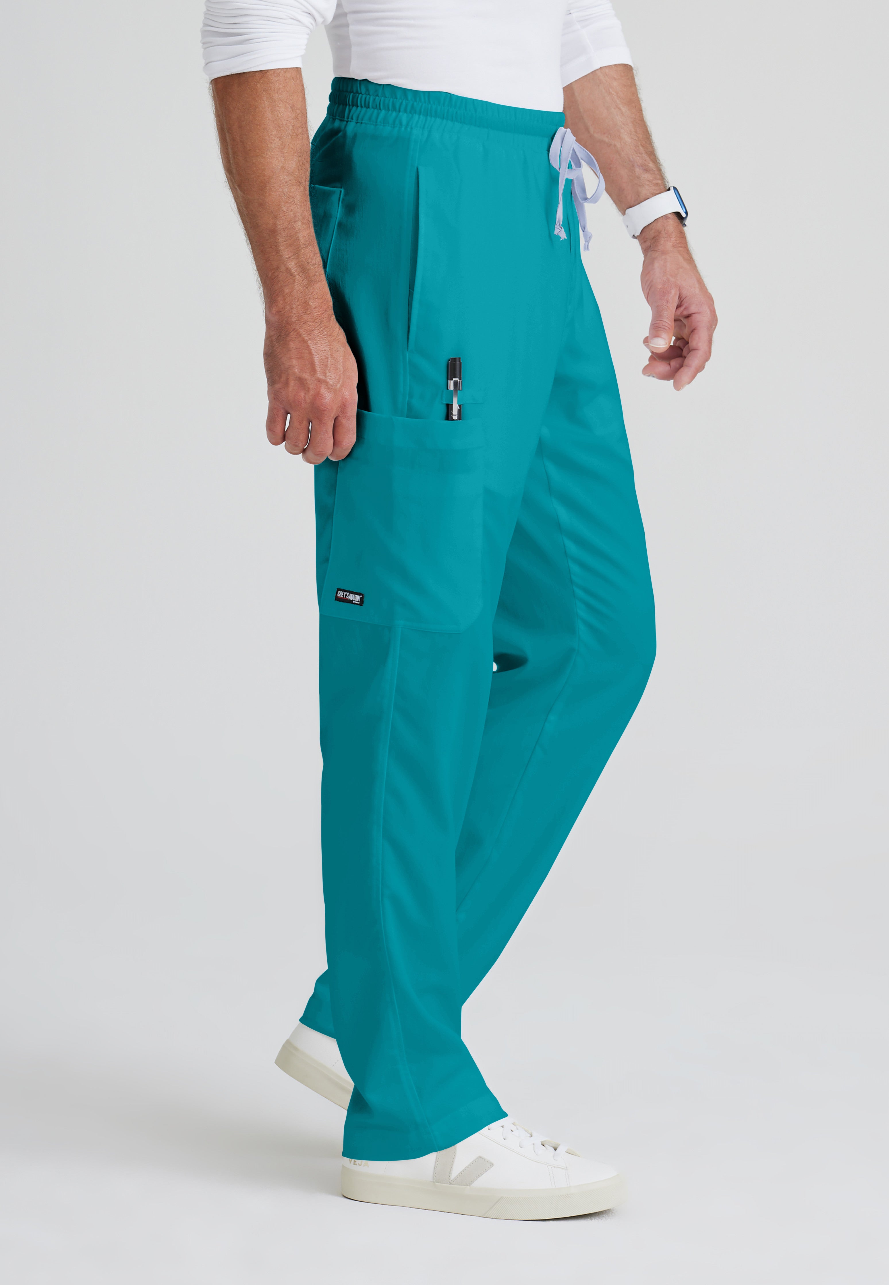 Side View of the Evan 5-Pocket Zip-Fly Scrub Pant in Teal from Grey's Anatomy™ by Barco Classic