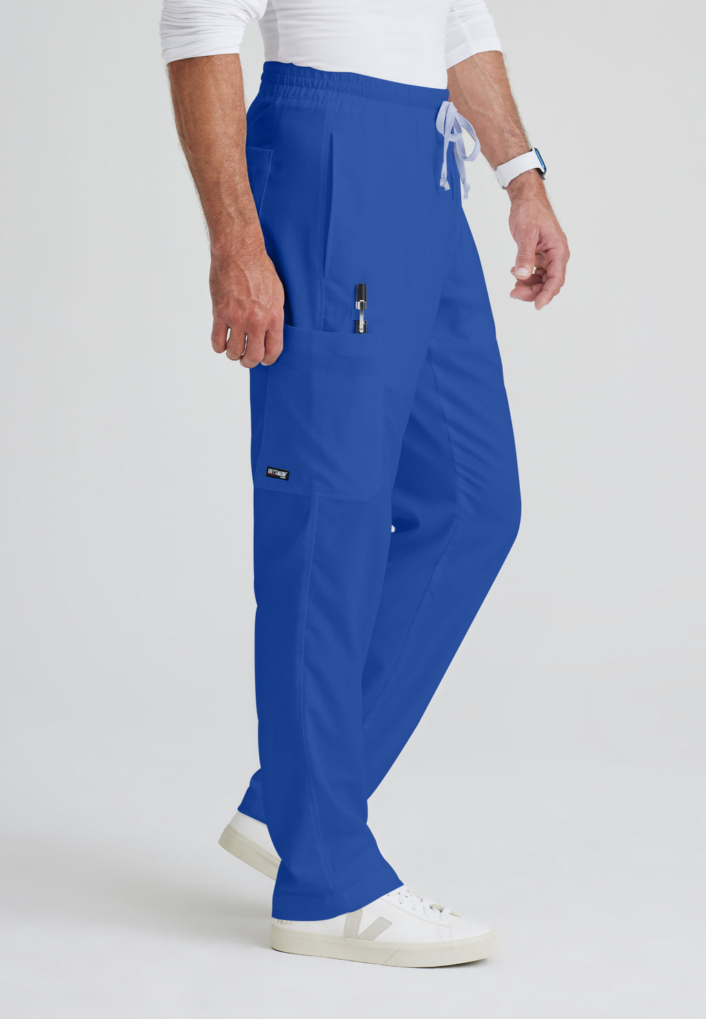 Side View of the Evan 5-Pocket Zip-Fly Scrub Pant in Galaxy from Grey's Anatomy™ by Barco Classic