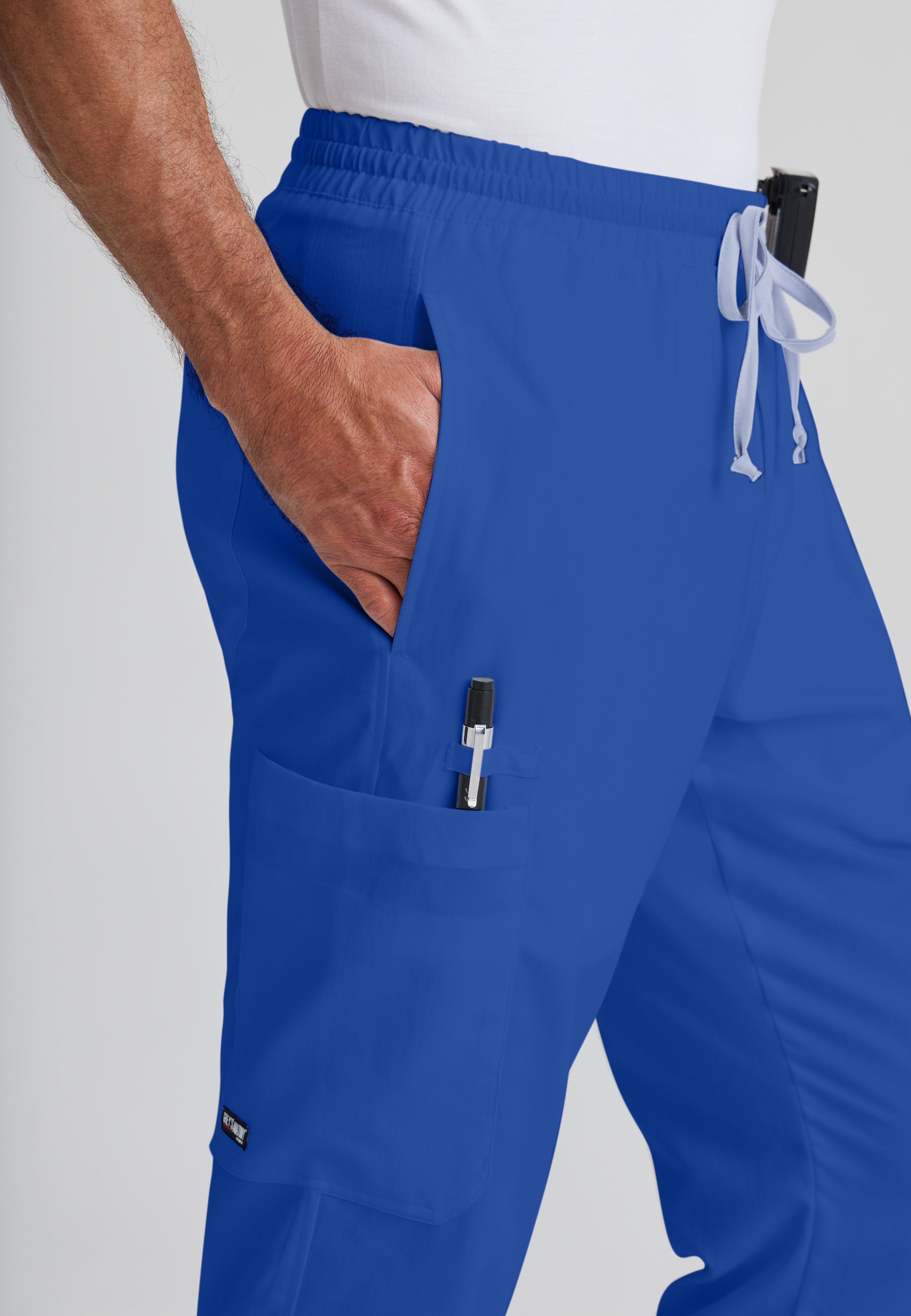 Detail Shot of the Evan 5-Pocket Zip-Fly Scrub Pant in Galaxy from Grey's Anatomy™ by Barco Classic