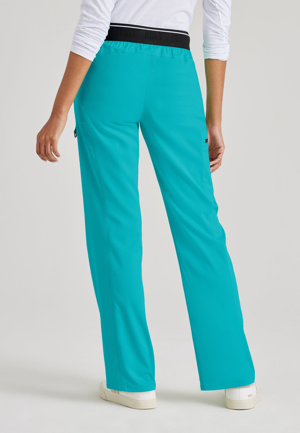Grey's Anatomy Spandex-Stretch Kim scrub Pants in teal - Straight leg. Mid rise. 3 pockets. Soft touch moisture wicking fabric. 