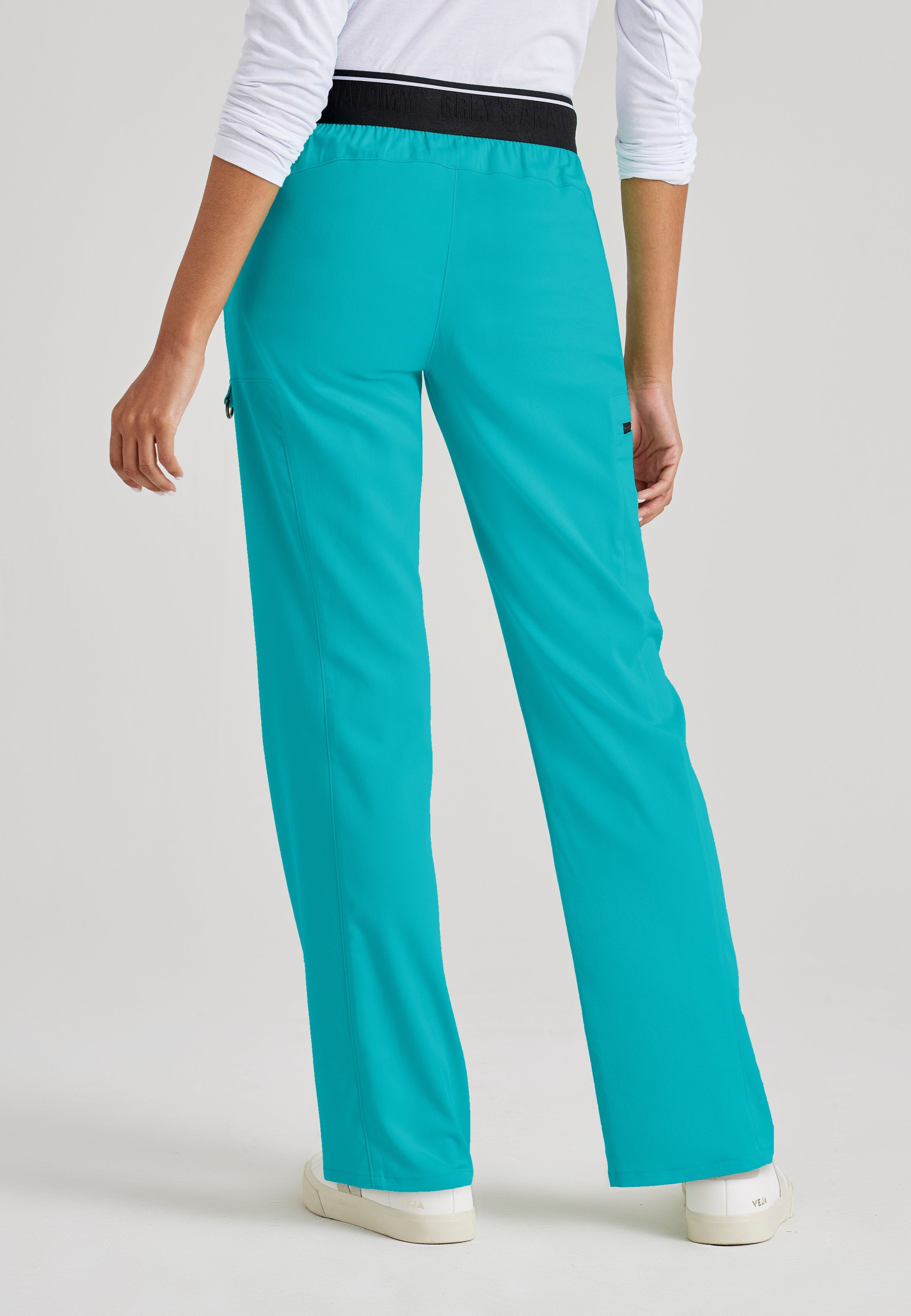 Grey's Anatomy Spandex-Stretch Kim scrub Pants in teal - Straight leg. Mid rise. 3 pockets. Soft touch moisture wicking fabric. 