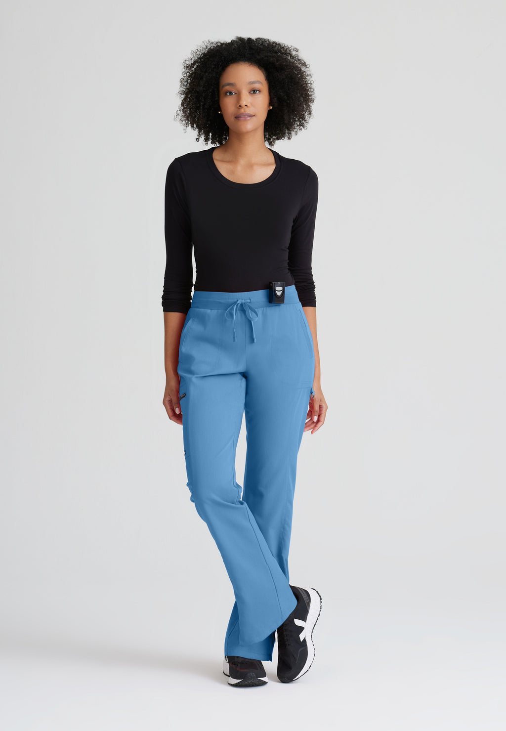 Full Body View of the Kim 3-Pocket Mid-Rise Straight Leg Scrub Pant in Ciel Blue from Grey's Anatomy™ by Barco Spandex Stretch