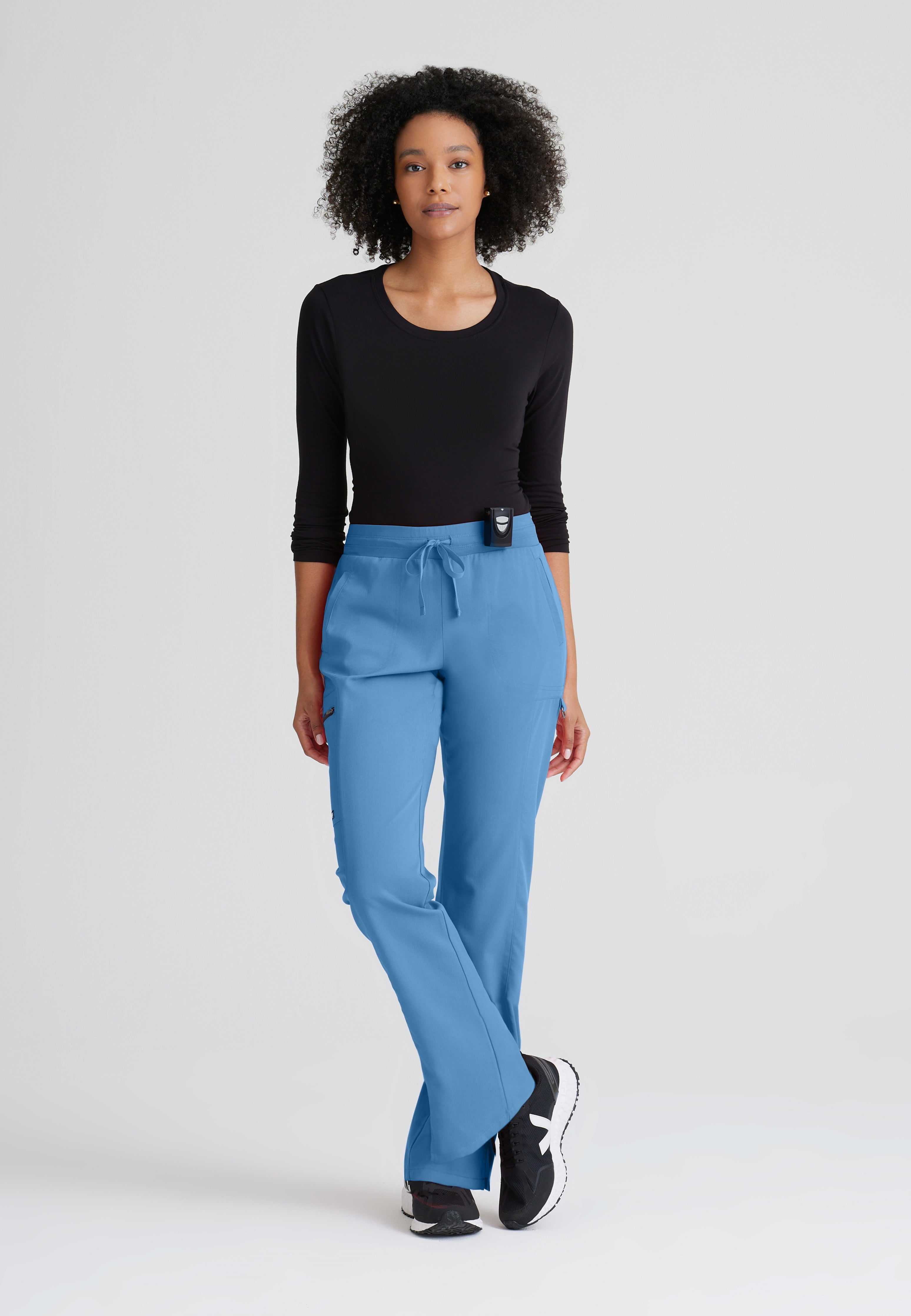 Full Body View of the Kim 3-Pocket Mid-Rise Straight Leg Scrub Pant in Ciel Blue from Grey's Anatomy™ by Barco Spandex Stretch