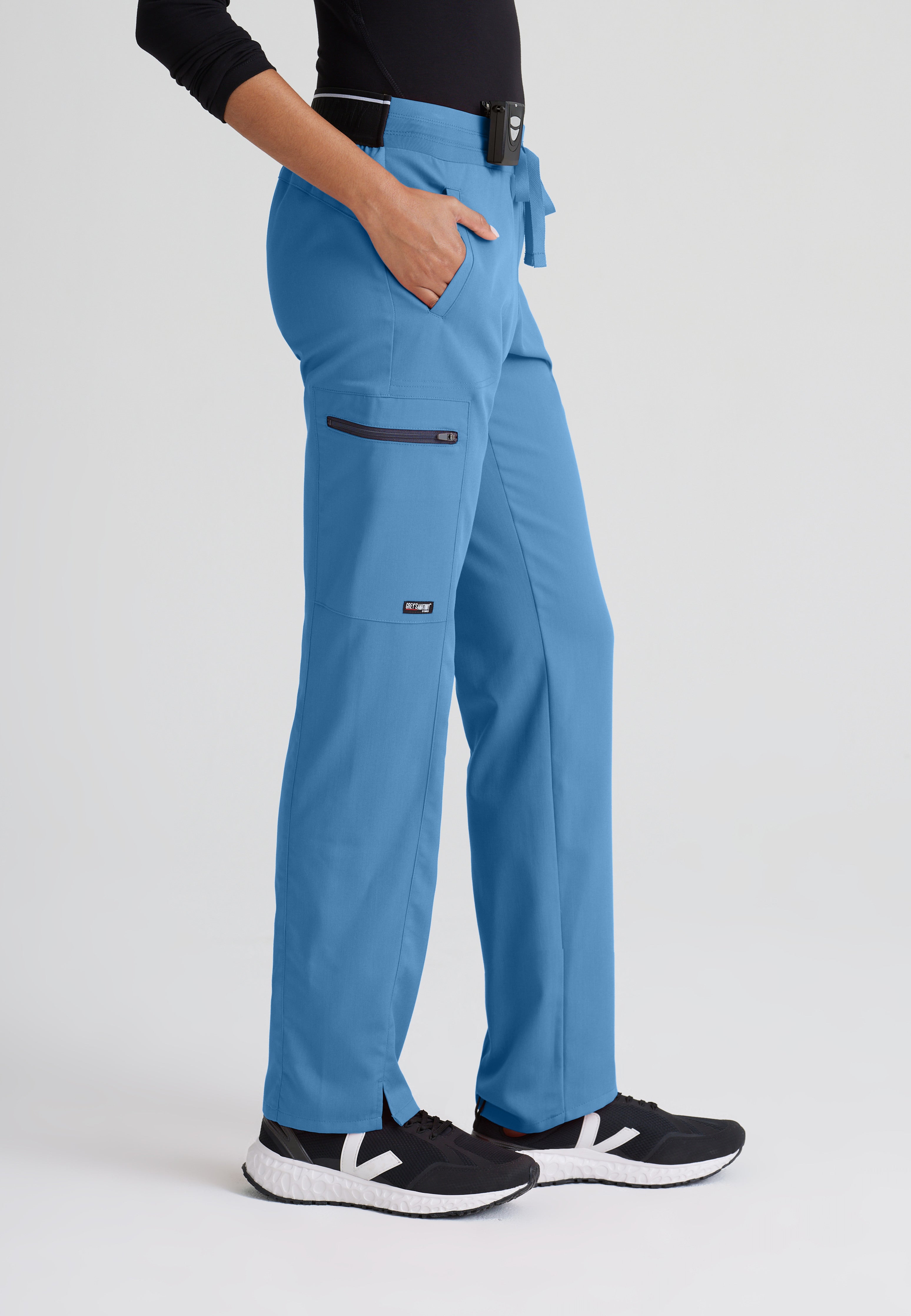 Side View of the Kim 3-Pocket Mid-Rise Straight Leg Scrub Pant in Ciel Blue from Grey's Anatomy™ by Barco Spandex Stretch