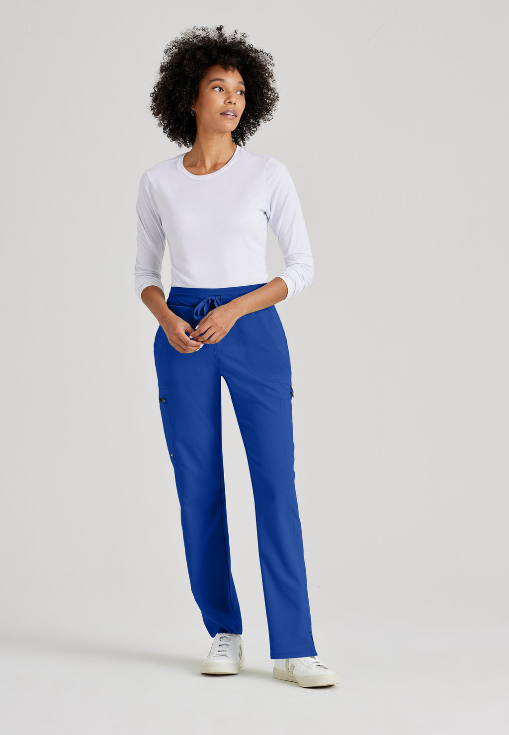 Full Body View of the Kim 3-Pocket Mid-Rise Straight Leg Scrub Pant in Galaxy from Grey's Anatomy™ by Barco Spandex Stretch