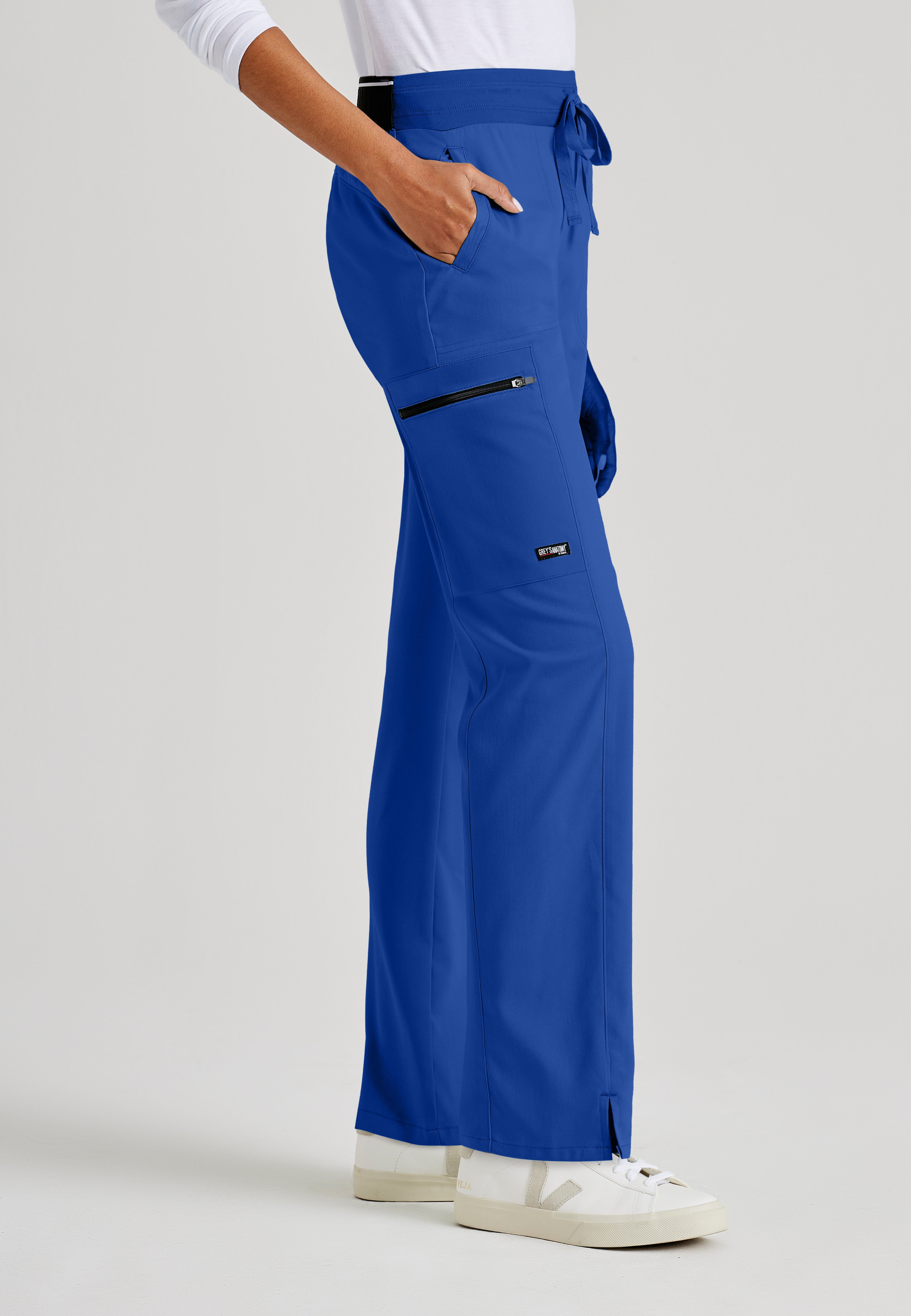 Side View of the Kim 3-Pocket Mid-Rise Straight Leg Scrub Pant in Galaxy from Grey's Anatomy™ by Barco Spandex Stretch
