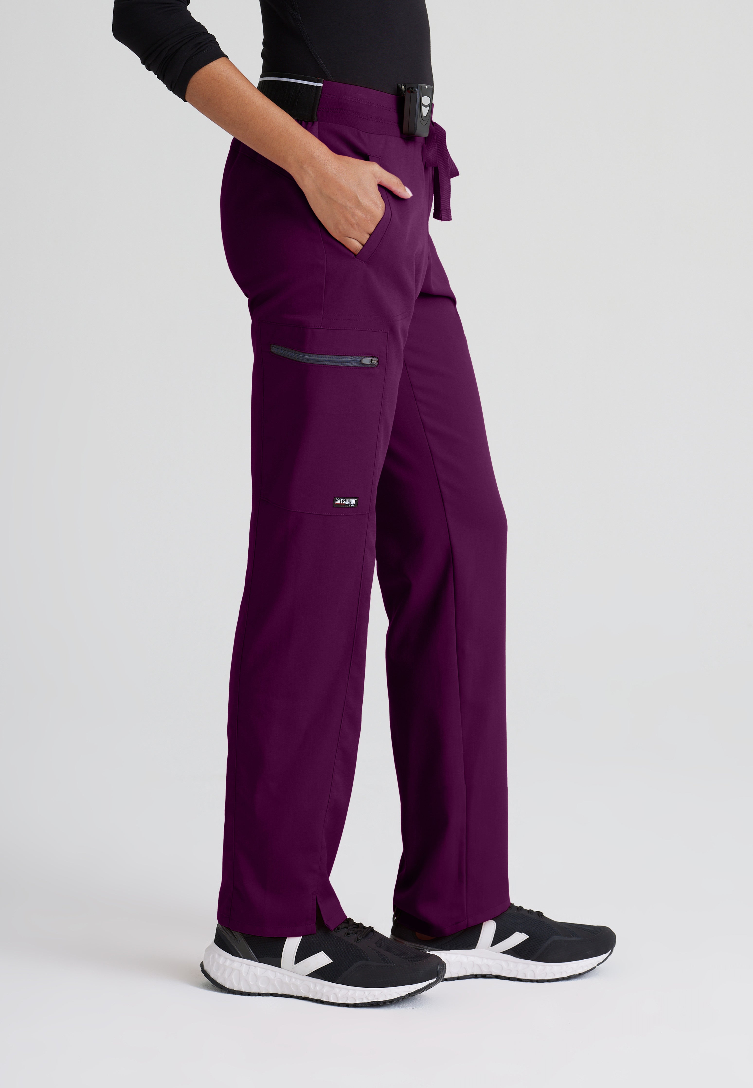 Side View of the Kim 3-Pocket Mid-Rise Straight Leg Scrub Pant in Wine from Grey's Anatomy™ by Barco Spandex Stretch