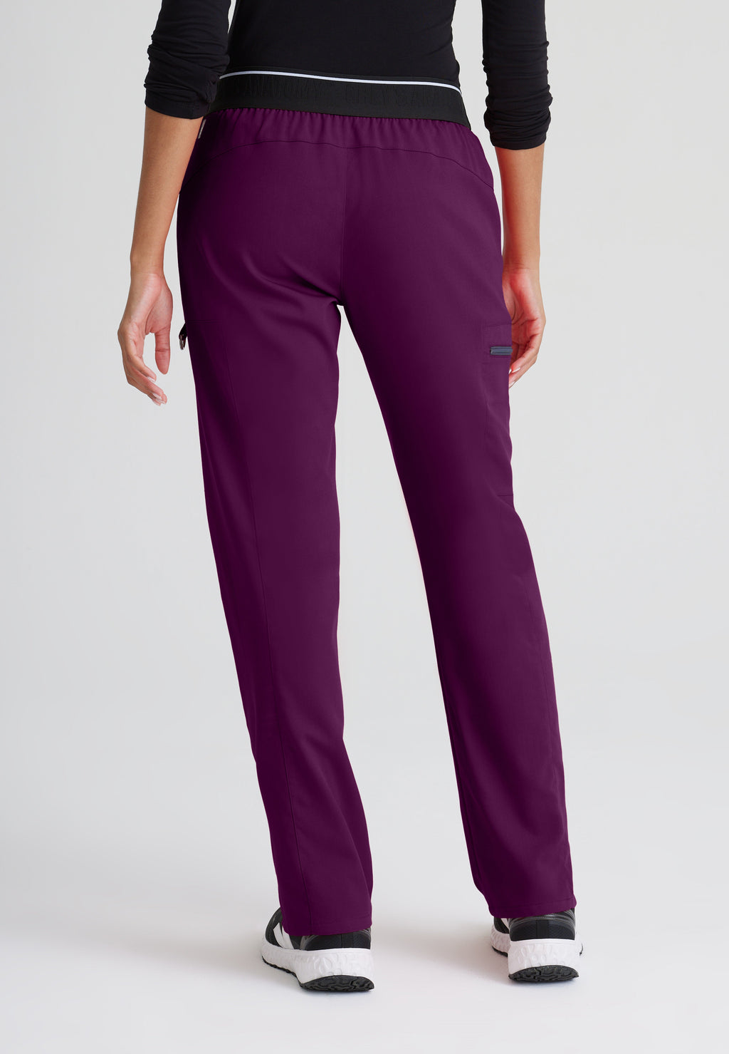 Back View of the Kim 3-Pocket Mid-Rise Straight Leg Scrub Pant in Wine from Grey's Anatomy™ by Barco Spandex Stretch