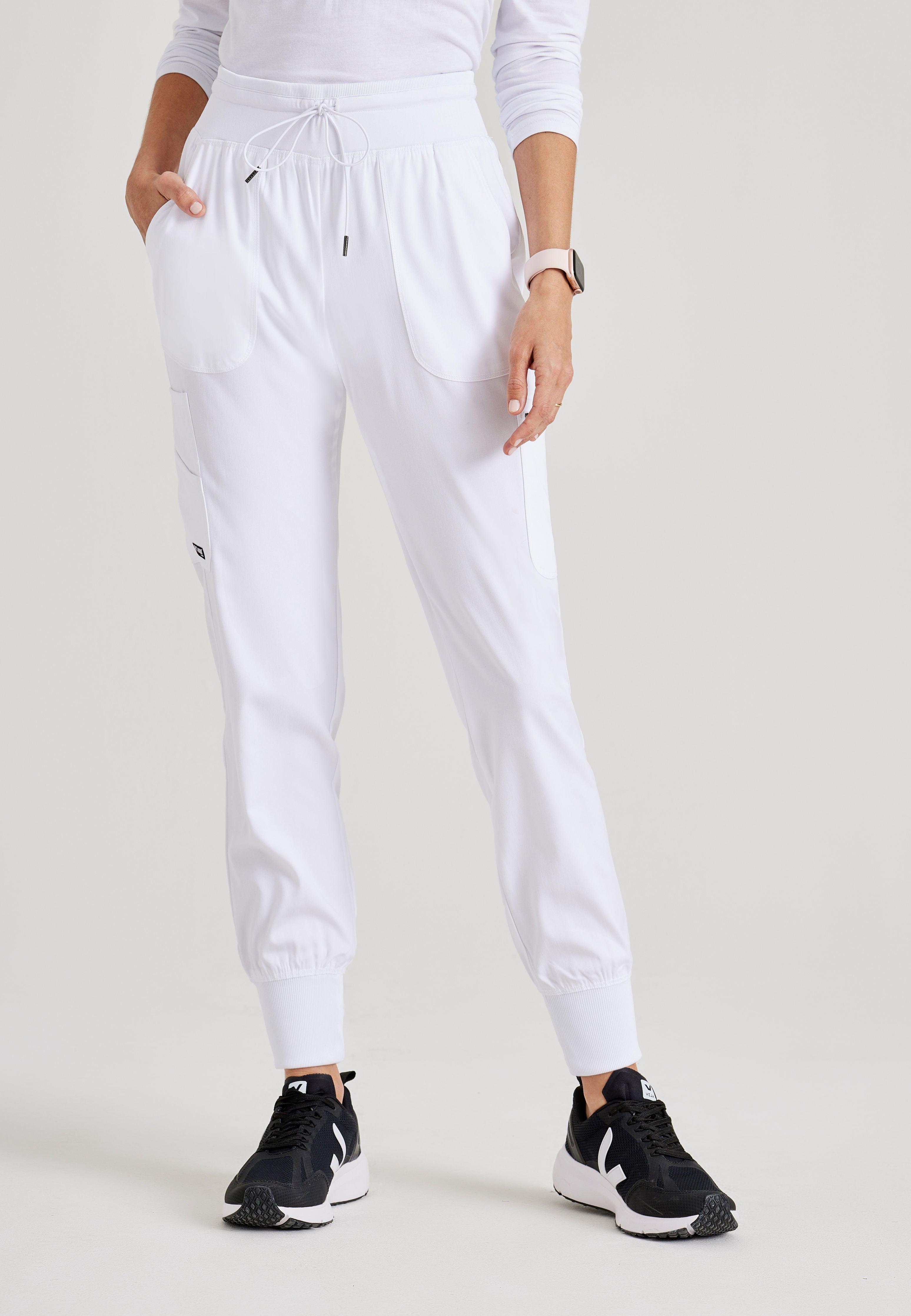 Grey's Anatomy Spandex-Stretch Women’s white Double Cargo Jogger Scrub Pants with Elastic Waistband. 7 pockets with ribbed waistband and cuffs.