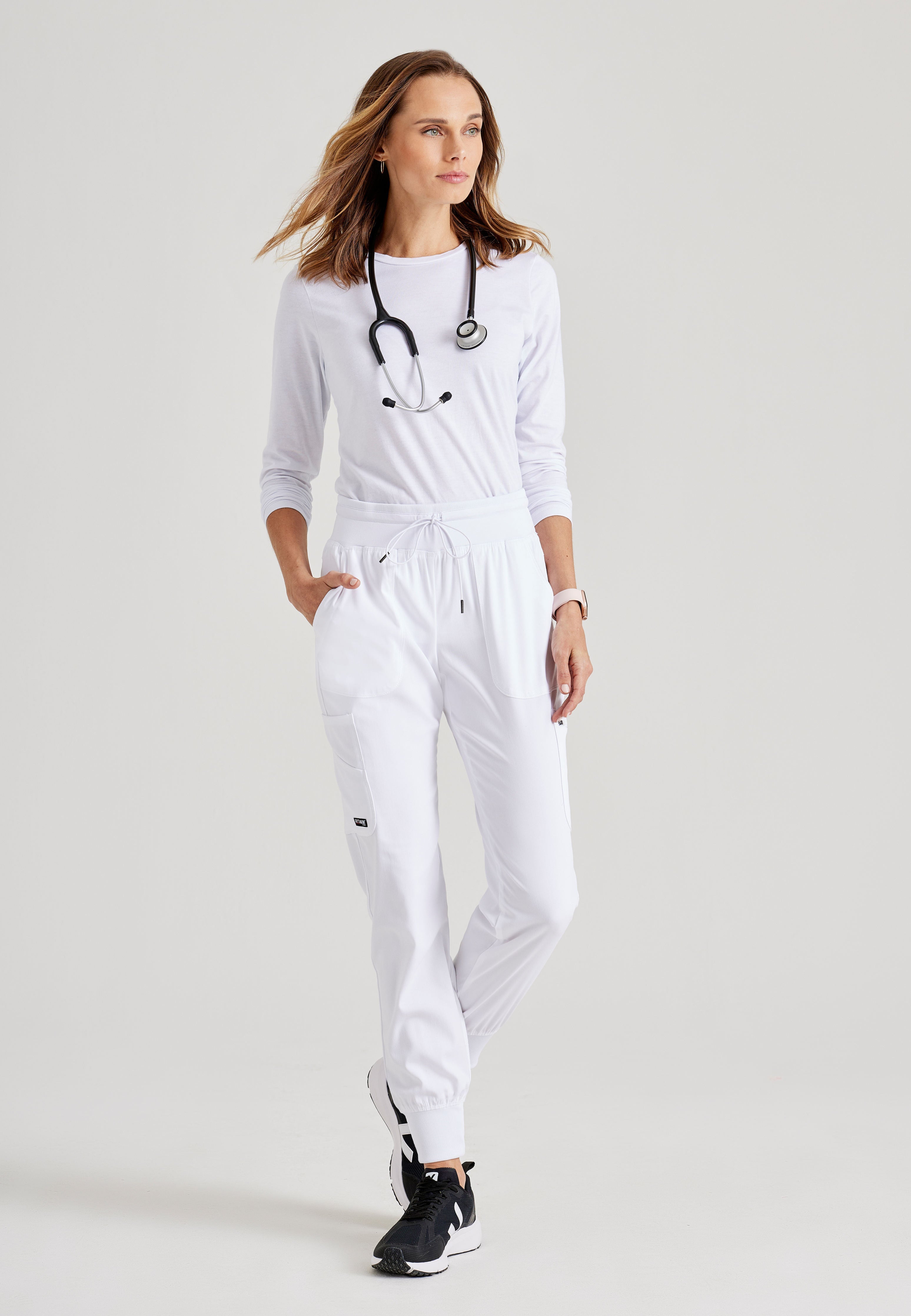 Grey's Anatomy Spandex-Stretch Women’s white Double Cargo Jogger Scrub Pants with Elastic Waistband. 7 pockets with ribbed waistband and cuffs.