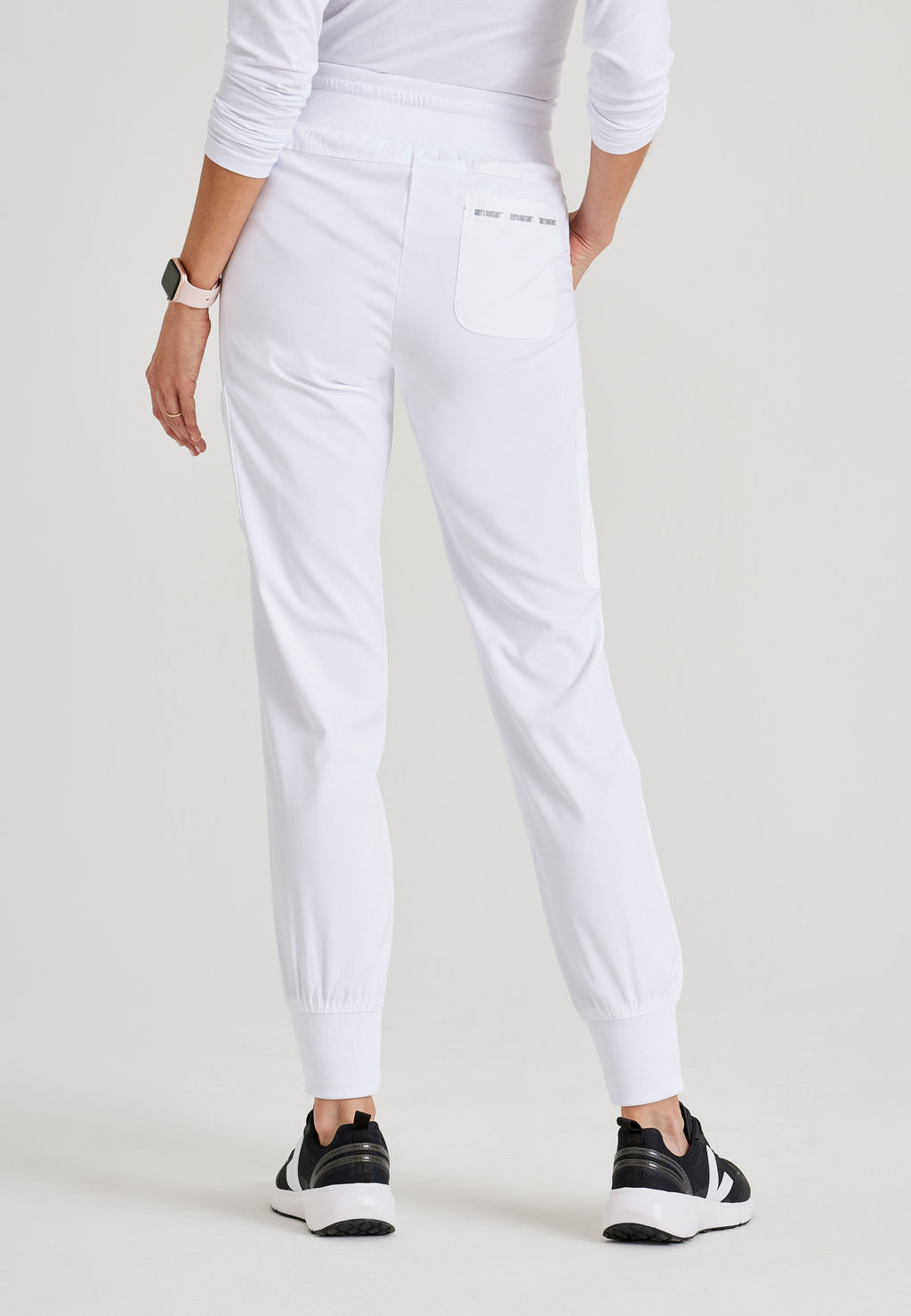 Grey's Anatomy Spandex-Stretch Women’s white Double Cargo Jogger Scrub Pants with Elastic Waistband. 7 pockets with ribbed waistband and cuffs.