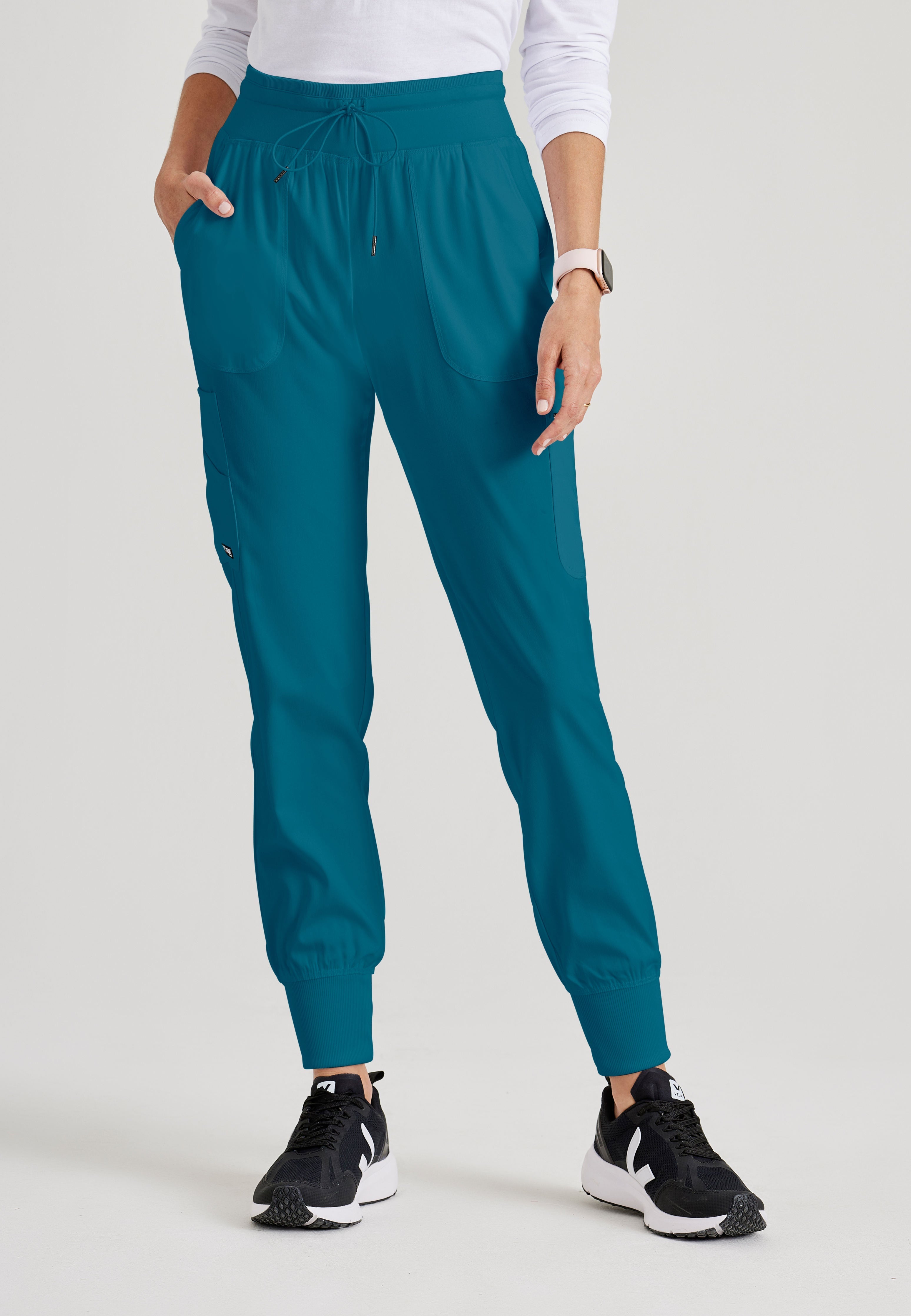 Grey's Anatomy Spandex-Stretch Women’s Bahama Double Cargo Jogger Scrub Pants with Elastic Waistband. 7 pockets with ribbed waistband and cuffs.
