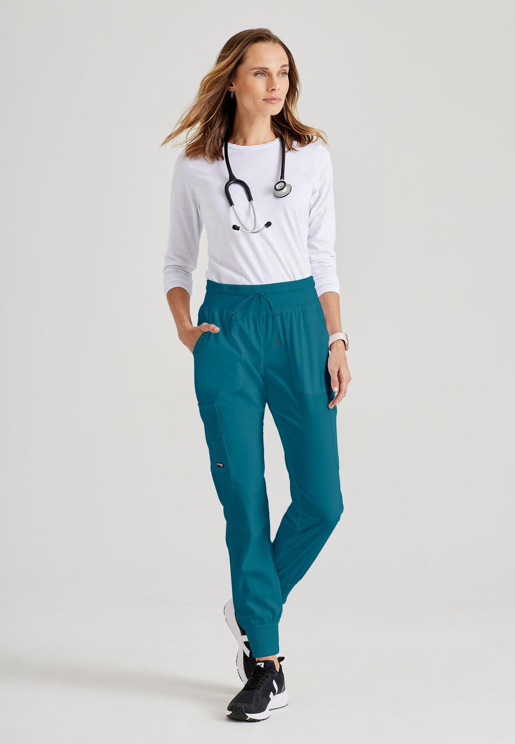 Grey's Anatomy Spandex-Stretch Women’s Bahama Double Cargo Jogger Scrub Pants with Elastic Waistband. 7 pockets with ribbed waistband and cuffs.