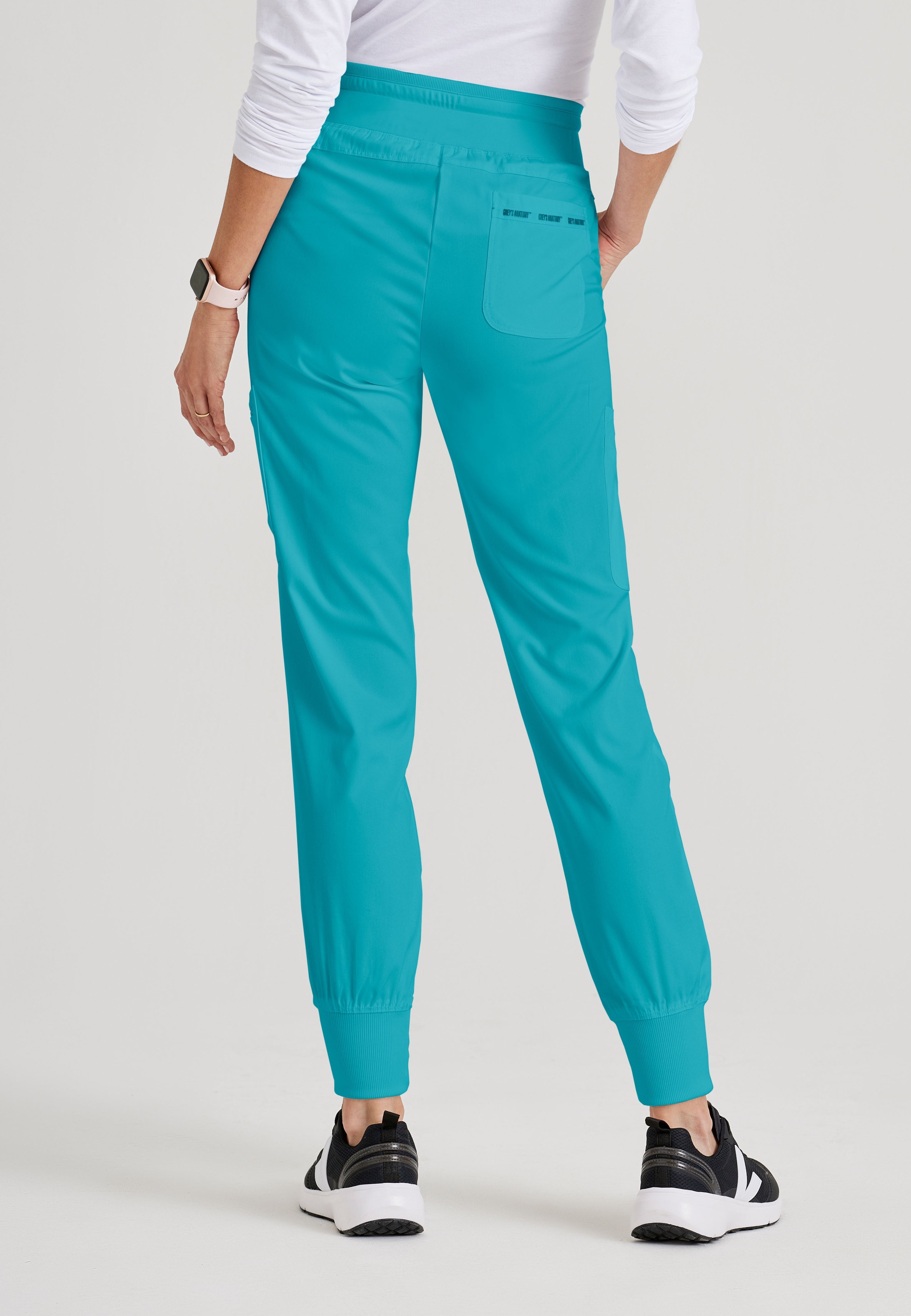 Grey's Anatomy Spandex-Stretch Women’s teal Double Cargo Jogger Scrub Pants with Elastic Waistband. 7 pockets with ribbed waistband and cuffs.