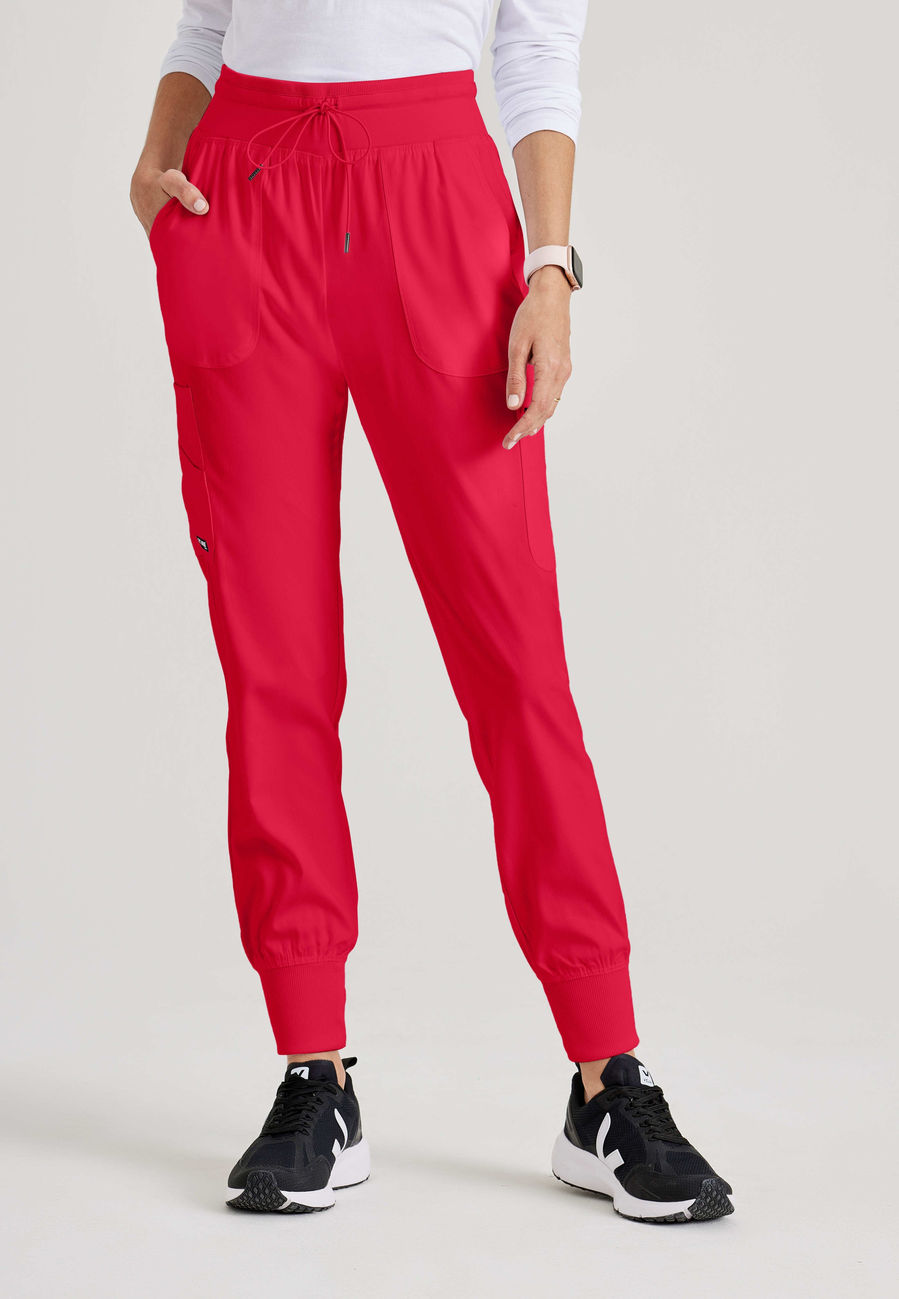 Front View of the Carly 7-Pocket Mid-Rise Jogger Scrub Pant in Scarlet Red from Grey's Anatomy™ by Barco Spandex Stretch