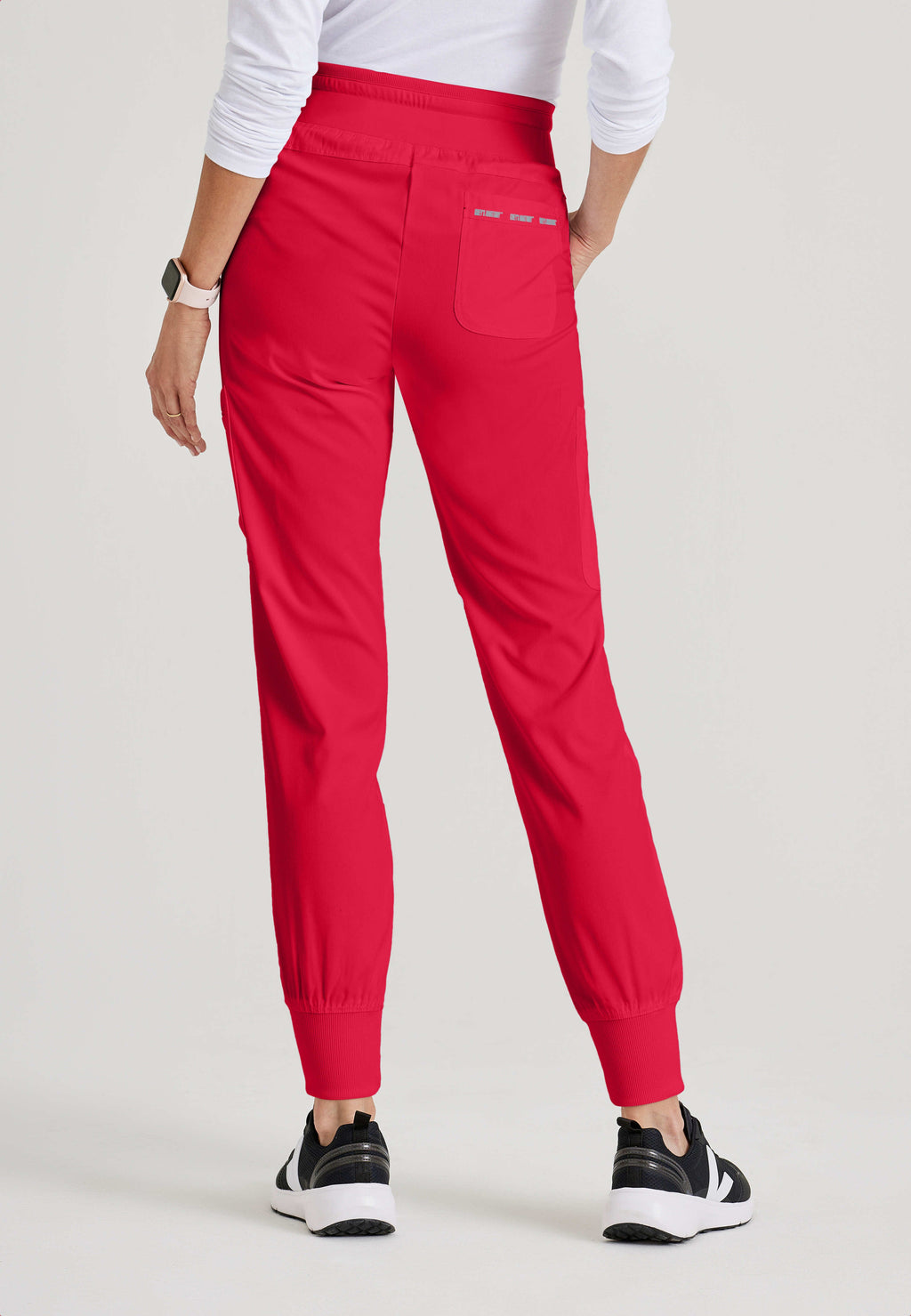 Side View of the Carly 7-Pocket Mid-Rise Jogger Scrub Pant in Scarlet Red from Grey's Anatomy™ by Barco Spandex Stretch