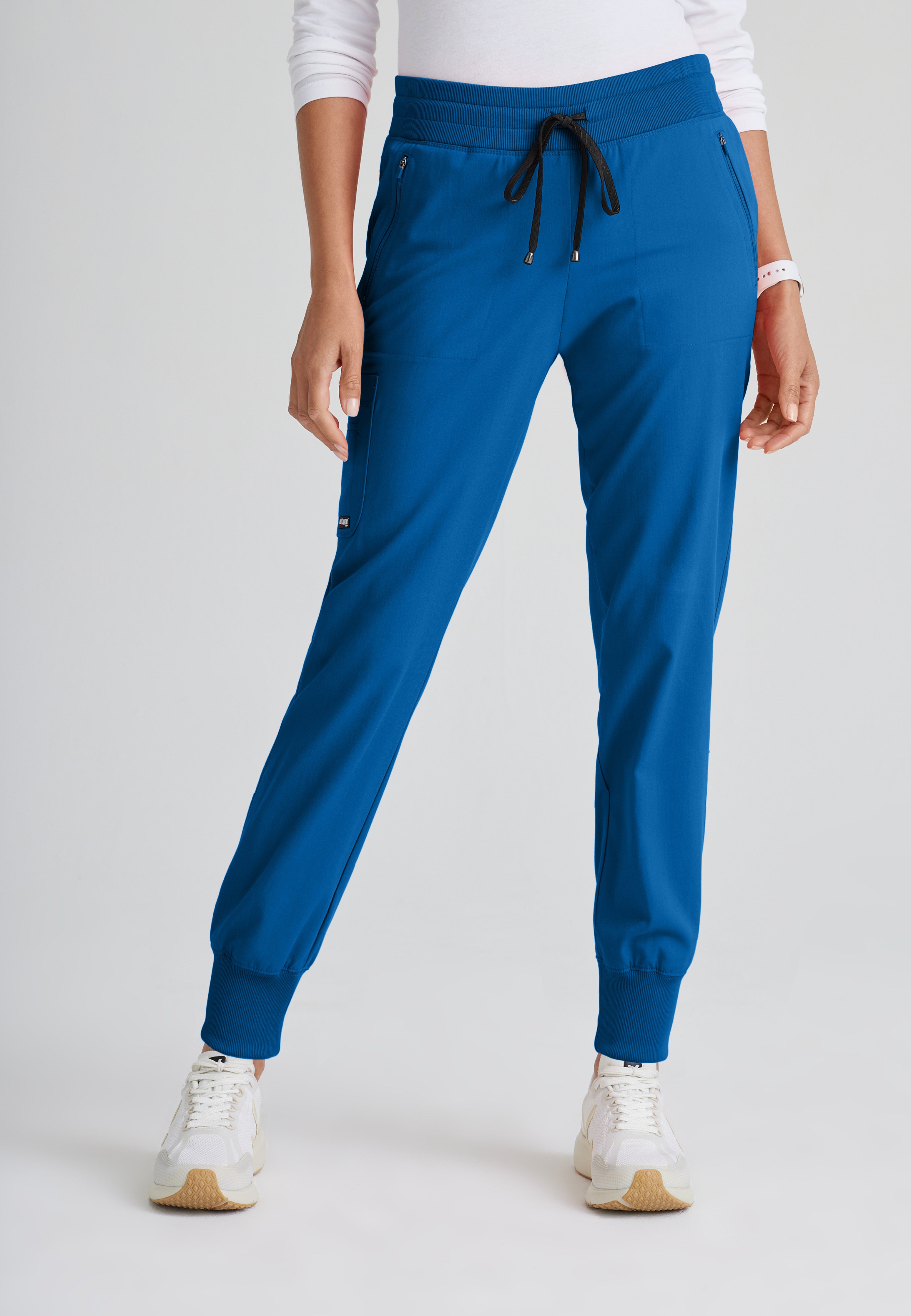 Front View of the Eden 5-Pocket Mid-Rise Jogger Scrub Pant in New Royal from Grey's Anatomy™ by Barco Spandex Stretch