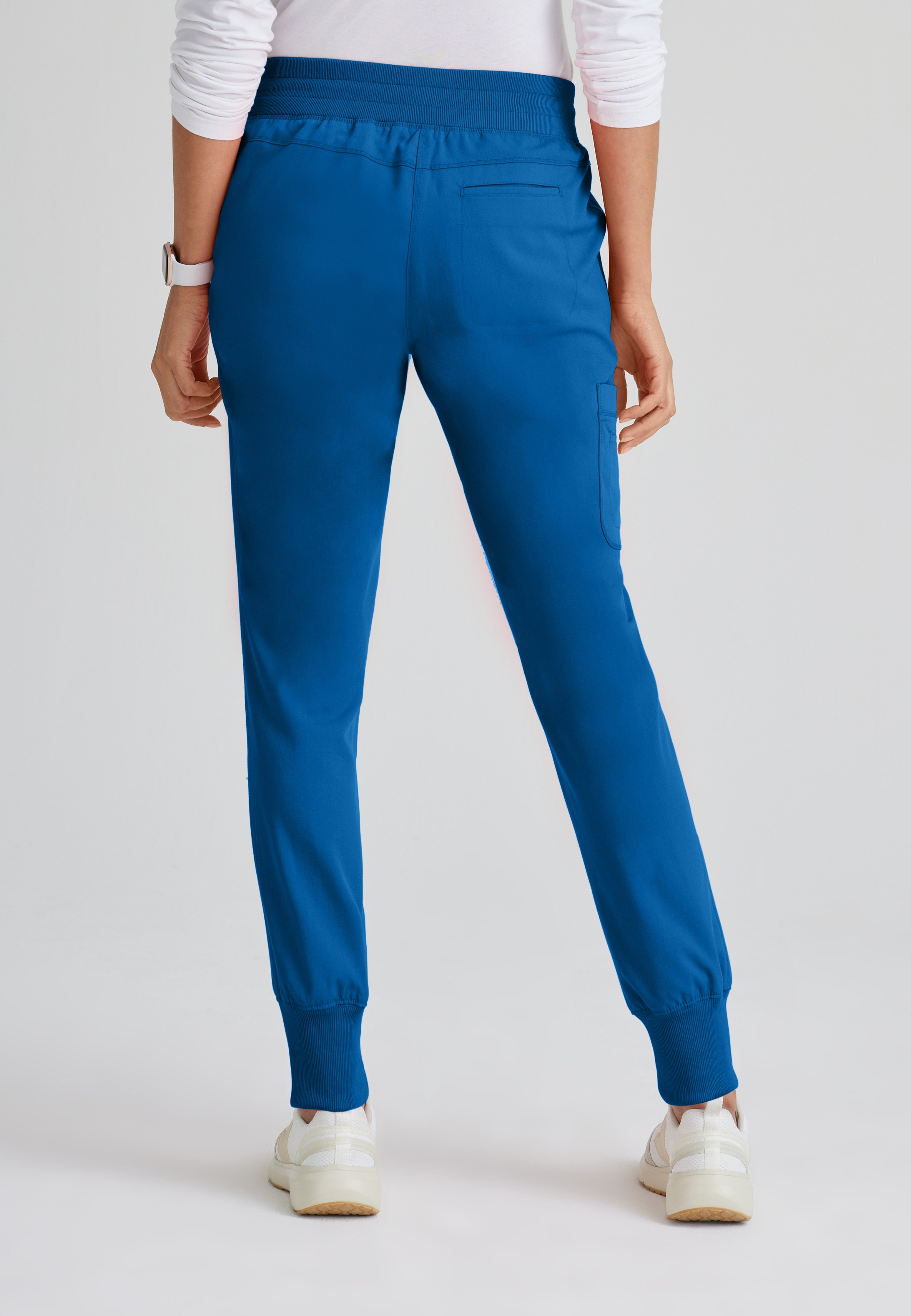 Back View of the Eden 5-Pocket Mid-Rise Jogger Scrub Pant in New Royal from Grey's Anatomy™ by Barco Spandex Stretch