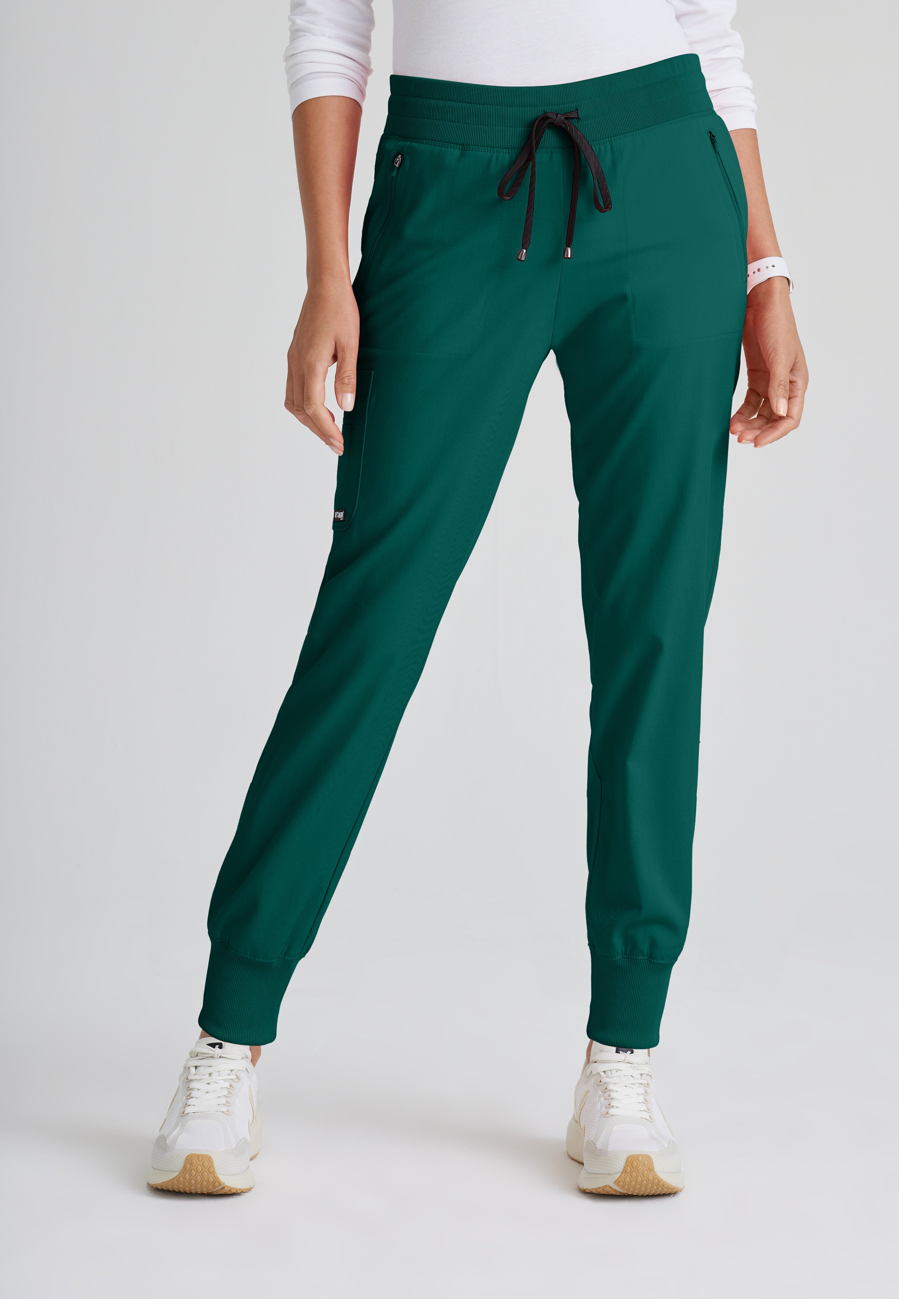 Front View of the Eden 5-Pocket Mid-Rise Jogger Scrub Pant in Hunter Green from Grey's Anatomy™ by Barco Spandex Stretch
