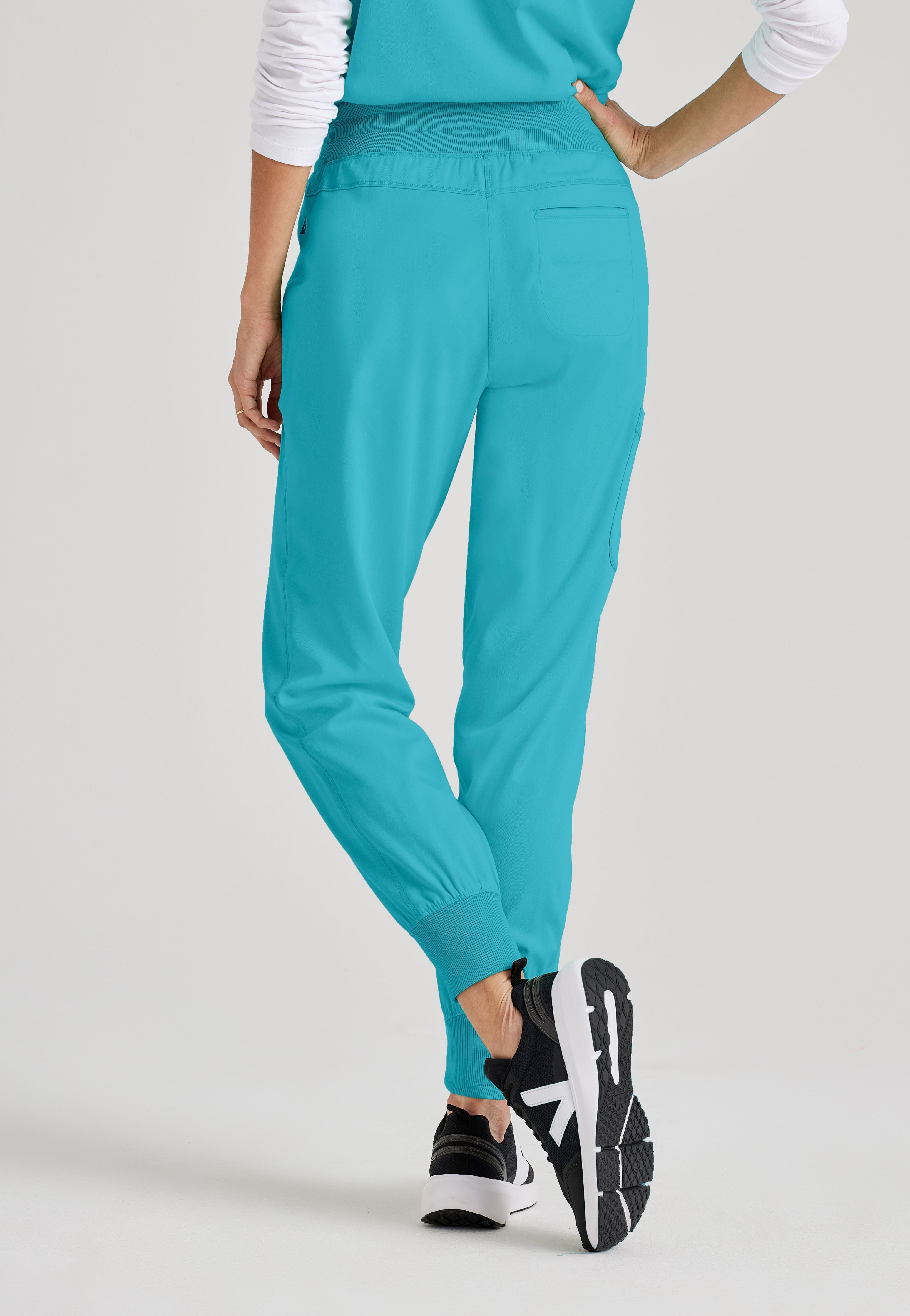 Grey's Anatomy Spandex-Stretch women's teal jogger scrub pants. Rib waist and cuffs. 5 pockets. Moisture-wicking stretch fabric.
