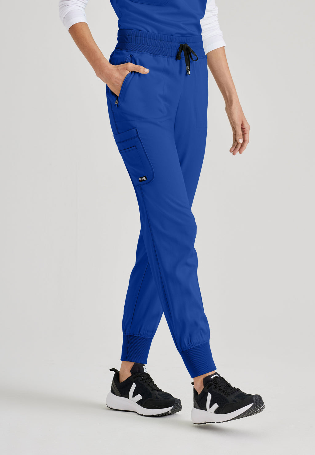 Back View of the Eden 5-Pocket Mid-Rise Jogger Scrub Pant in Galaxy from Grey's Anatomy™ by Barco Spandex Stretch
