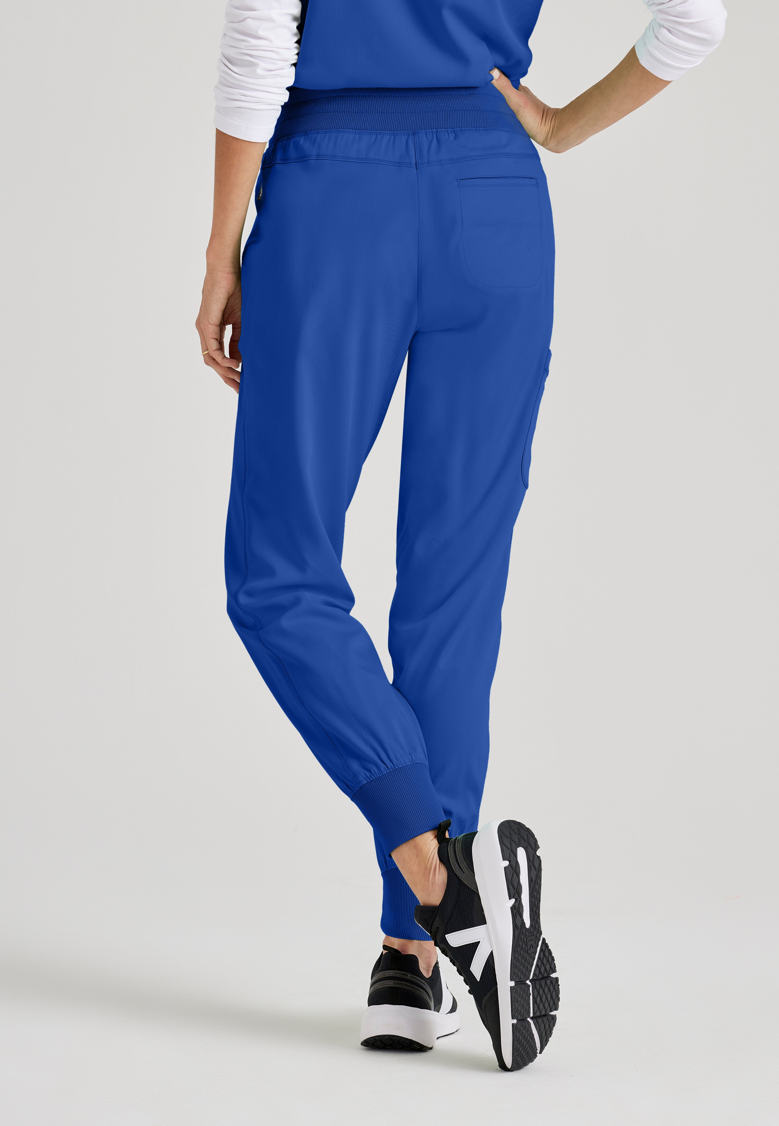 Back View of the Eden 5-Pocket Mid-Rise Jogger Scrub Pant in Galaxy from Grey's Anatomy™ by Barco Spandex Stretch