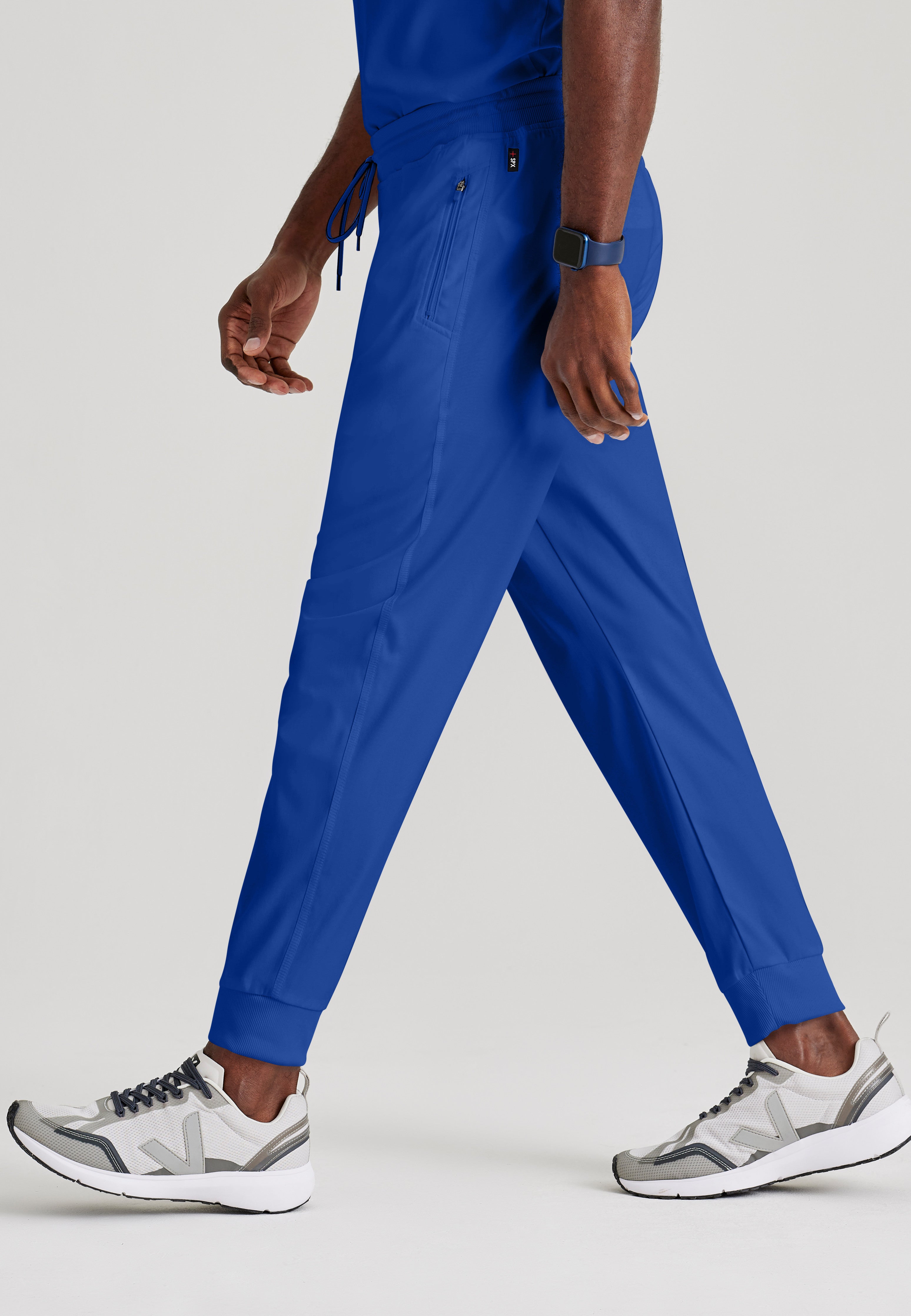 Full Body View of the Murphy 5-Pocket Jogger Scrub Pant in Galaxy from Grey's Anatomy™ by Barco Spandex Stretch