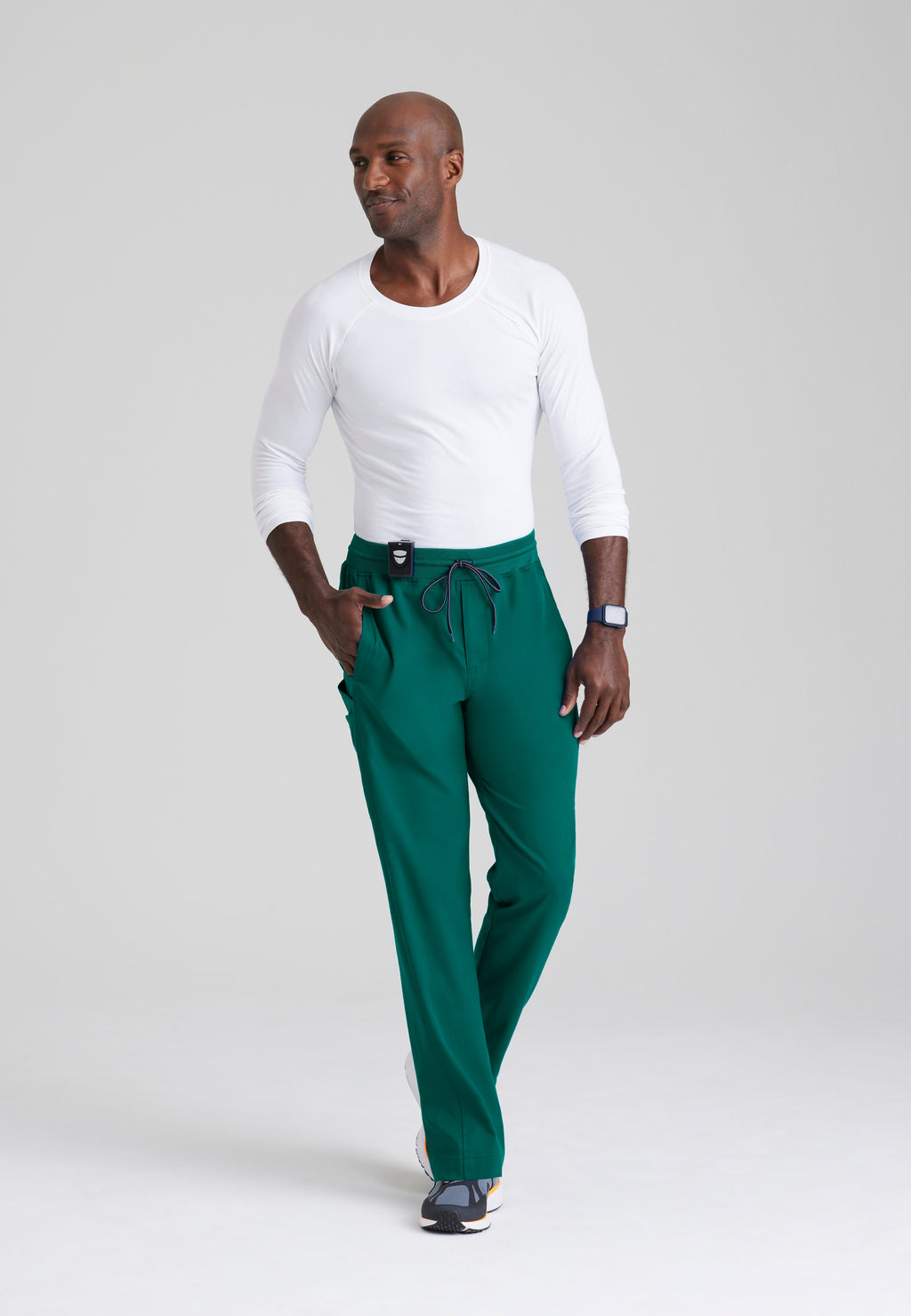 Full Body View of the Hudson Straight Leg Drawcord Pant in Hunter Green from Grey's Anatomy™ by Barco Spandex Stretch