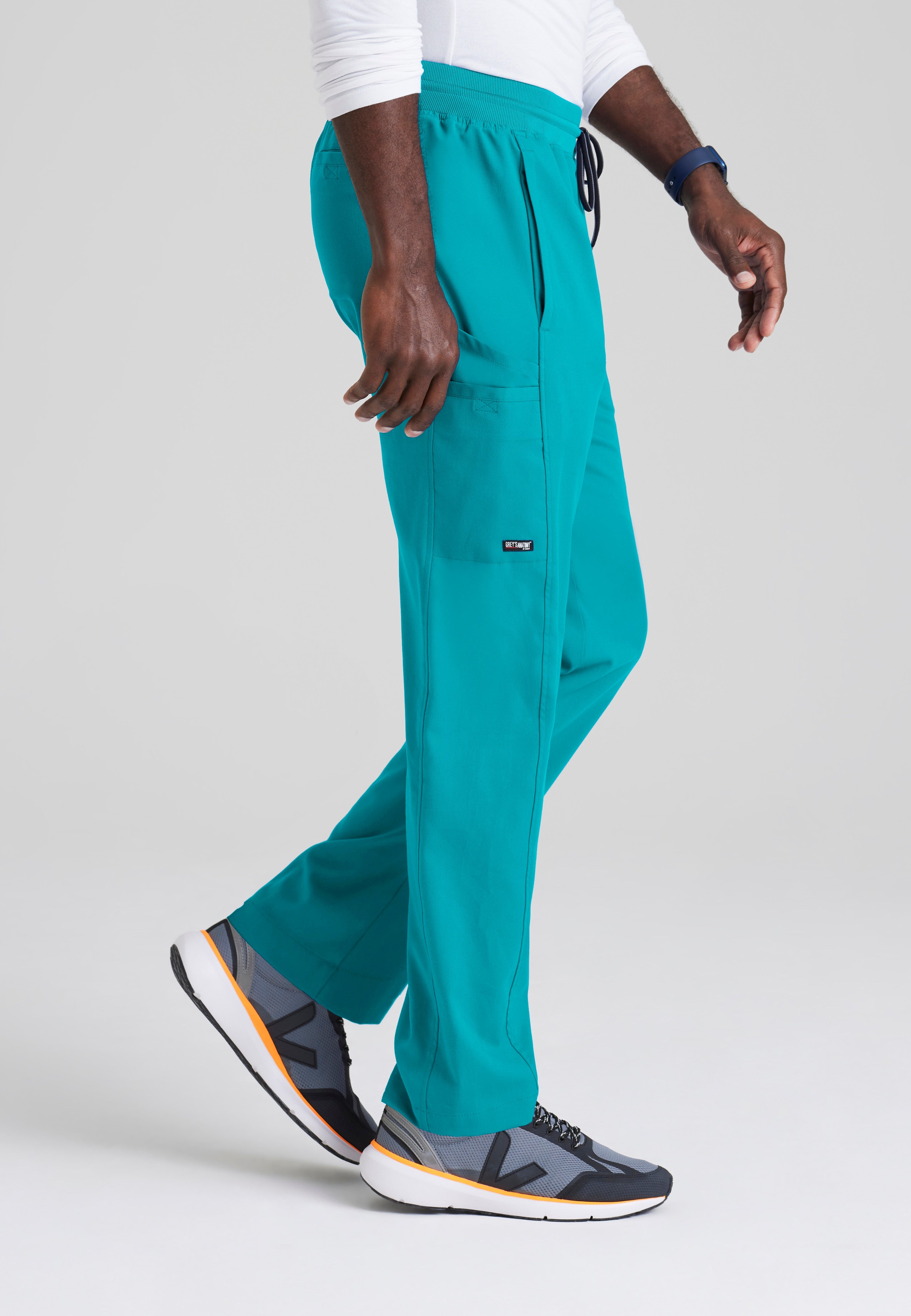 Side View of the Hudson Straight Leg Drawcord Pant in Teal from Grey's Anatomy™ by Barco Spandex Stretch