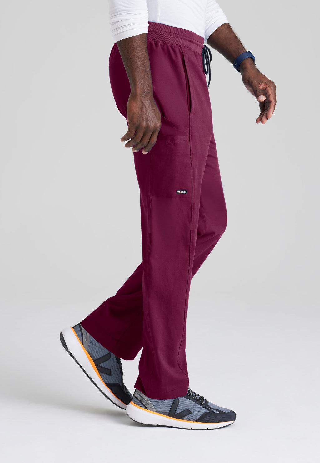 Side View of the Hudson Straight Leg Drawcord Pant in Wine from Grey's Anatomy™ by Barco Spandex Stretch