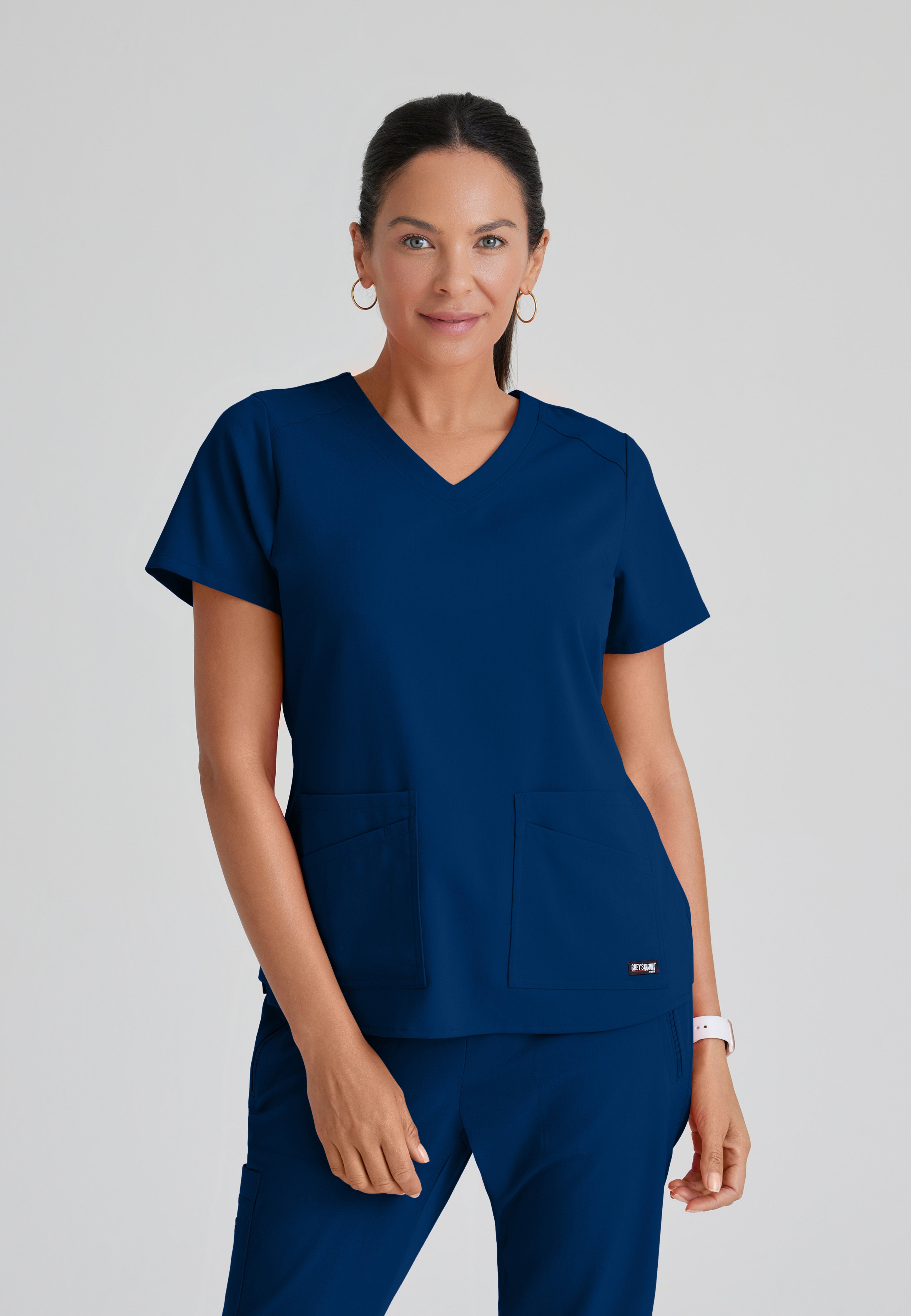 Front View of the Emma 4-Pocket V-Neck Scrub Top in Indigo from Grey's Anatomy™ by Barco Spandex Stretch
