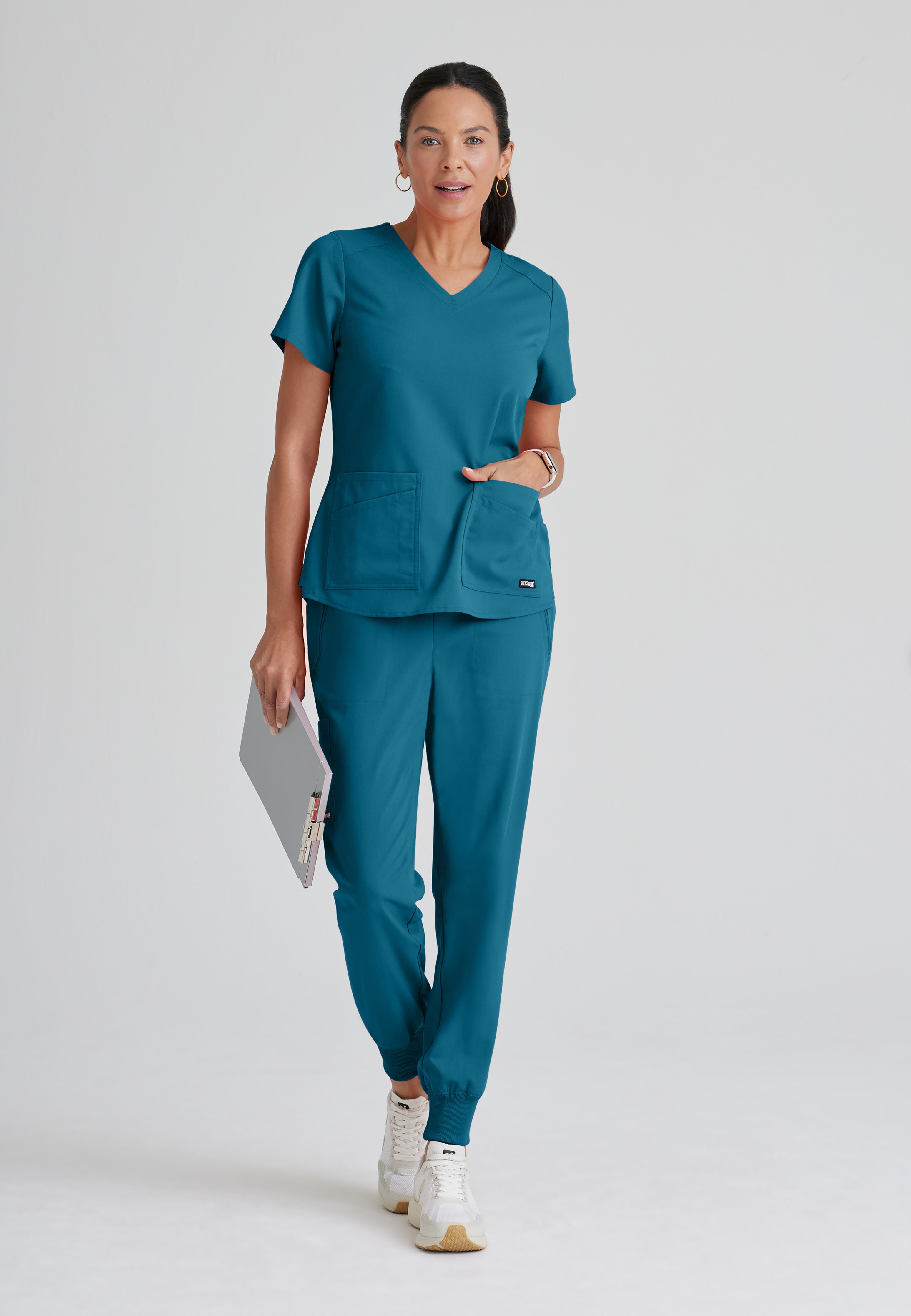 Full Body View of the Emma 4-Pocket V-Neck Scrub Top in Bahama from Grey's Anatomy™ by Barco Spandex Stretch