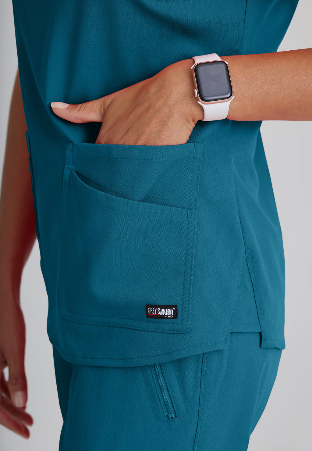 Detail Shot of the Emma 4-Pocket V-Neck Scrub Top in Bahama from Grey's Anatomy™ by Barco Spandex Stretch