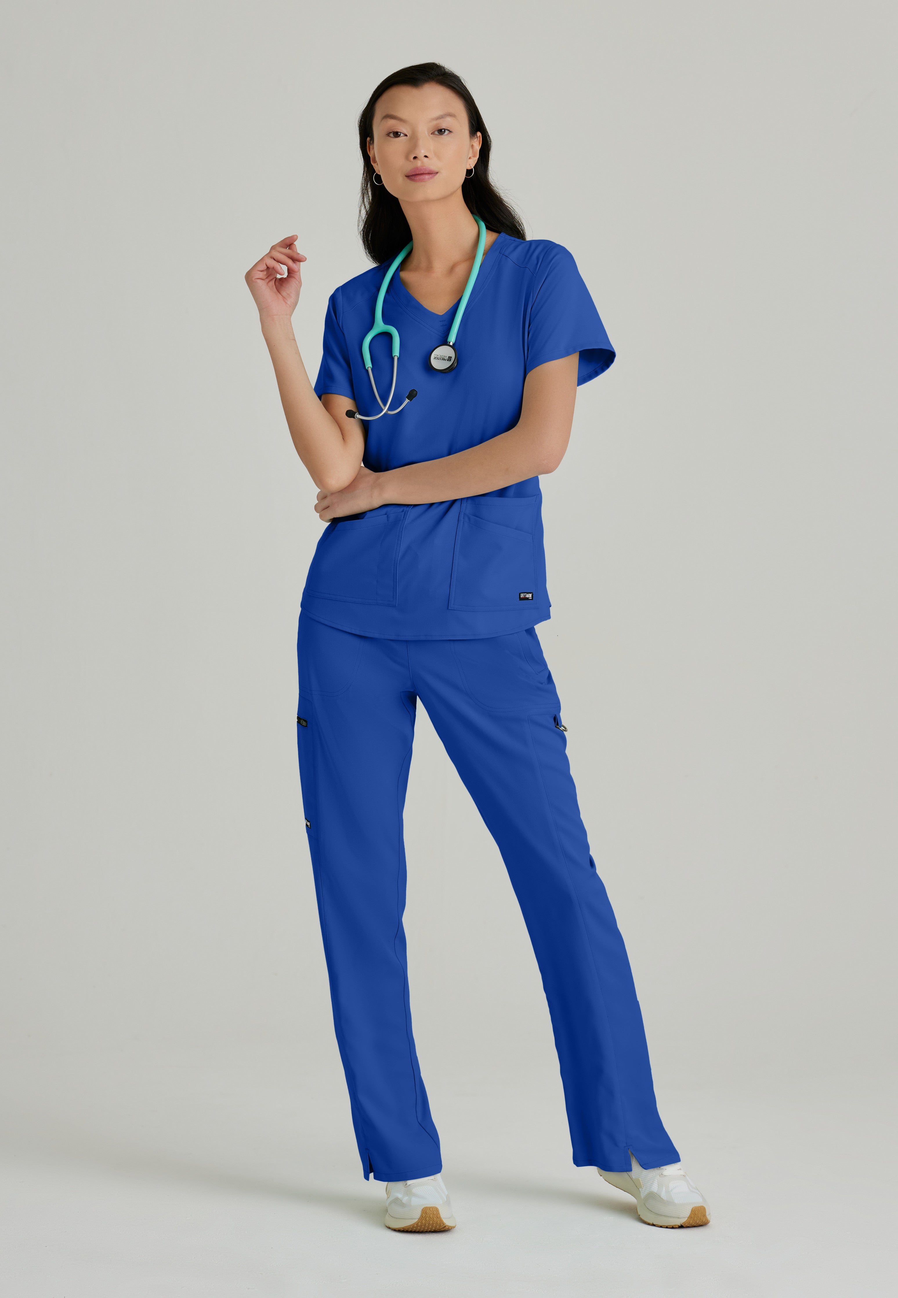 Full Body View of the Emma 4-Pocket V-Neck Scrub Top in Galaxy from Grey's Anatomy™ by Barco Spandex Stretch