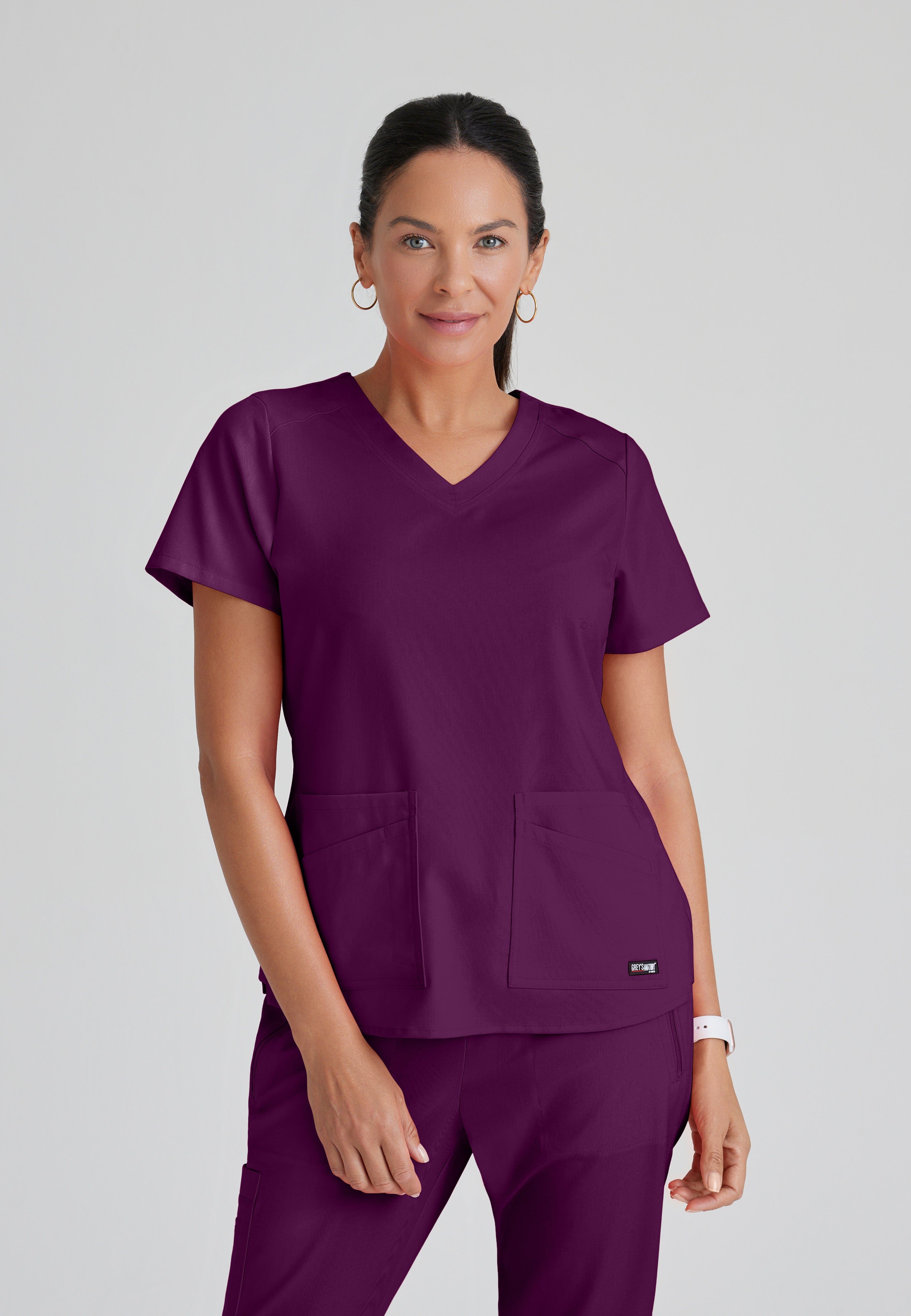 Front View of the Emma 4-Pocket V-Neck Scrub Top in Wine from Grey's Anatomy™ by Barco Spandex Stretch