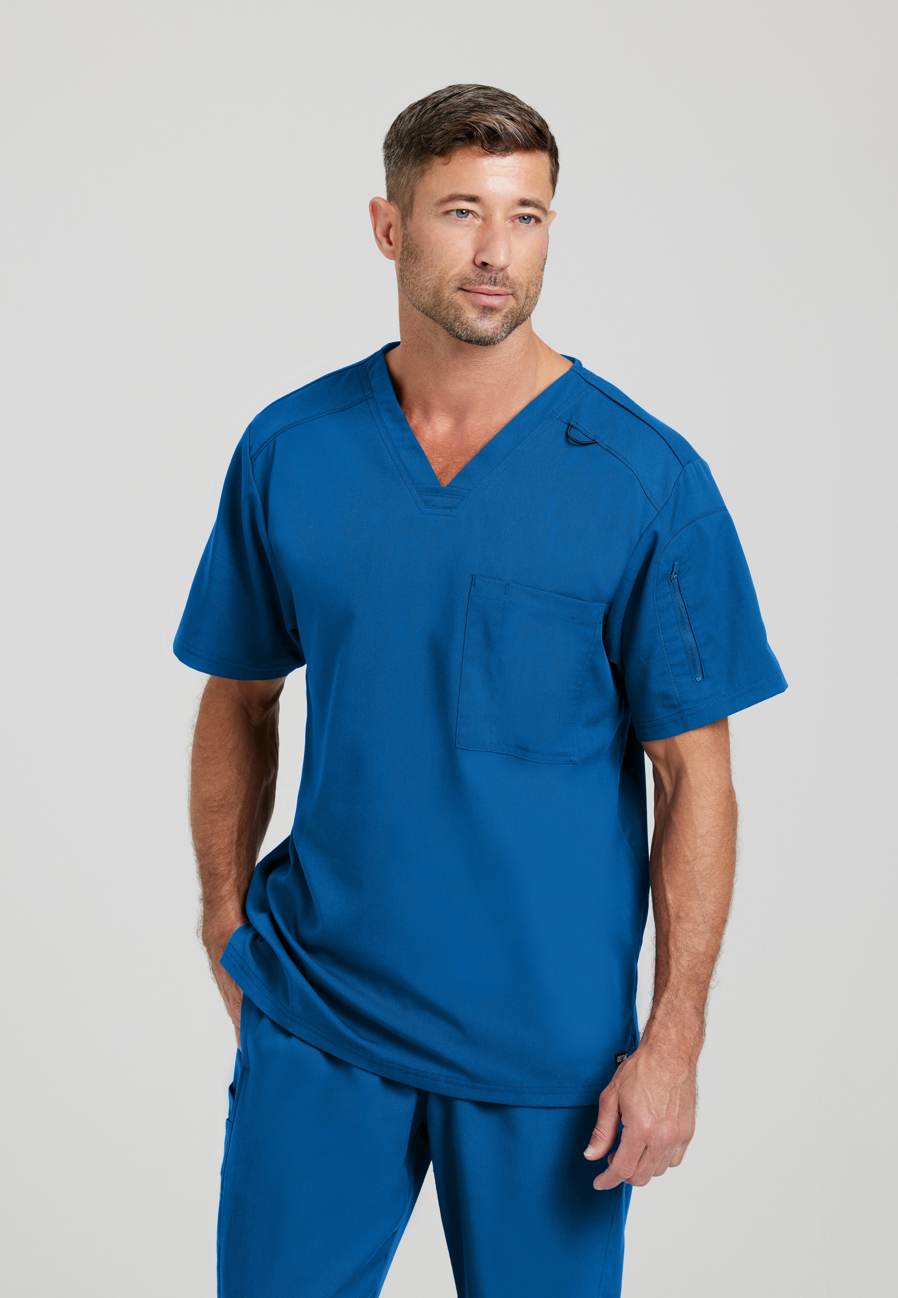 Front View of the Murphy 2-Pocket V-Neck Scrub Top in New Royal from Grey's Anatomy™ by Barco Spandex Stretch