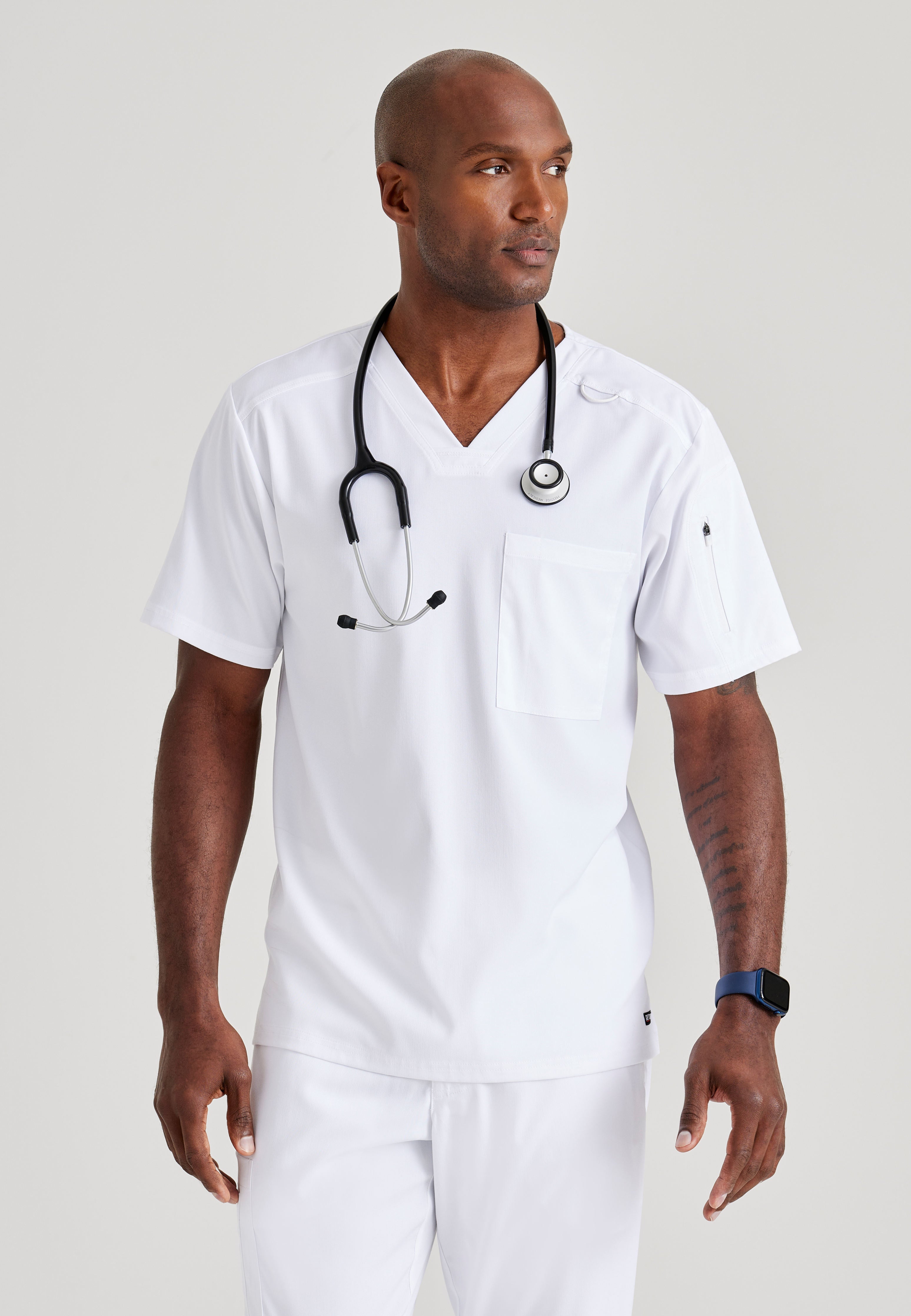 Grey's Anatomy Spandex-Stretch Men’s white Chest Pocket V-Neck Scrub Top. Bungee loop. Soft stretch fabric wicks moisture. 