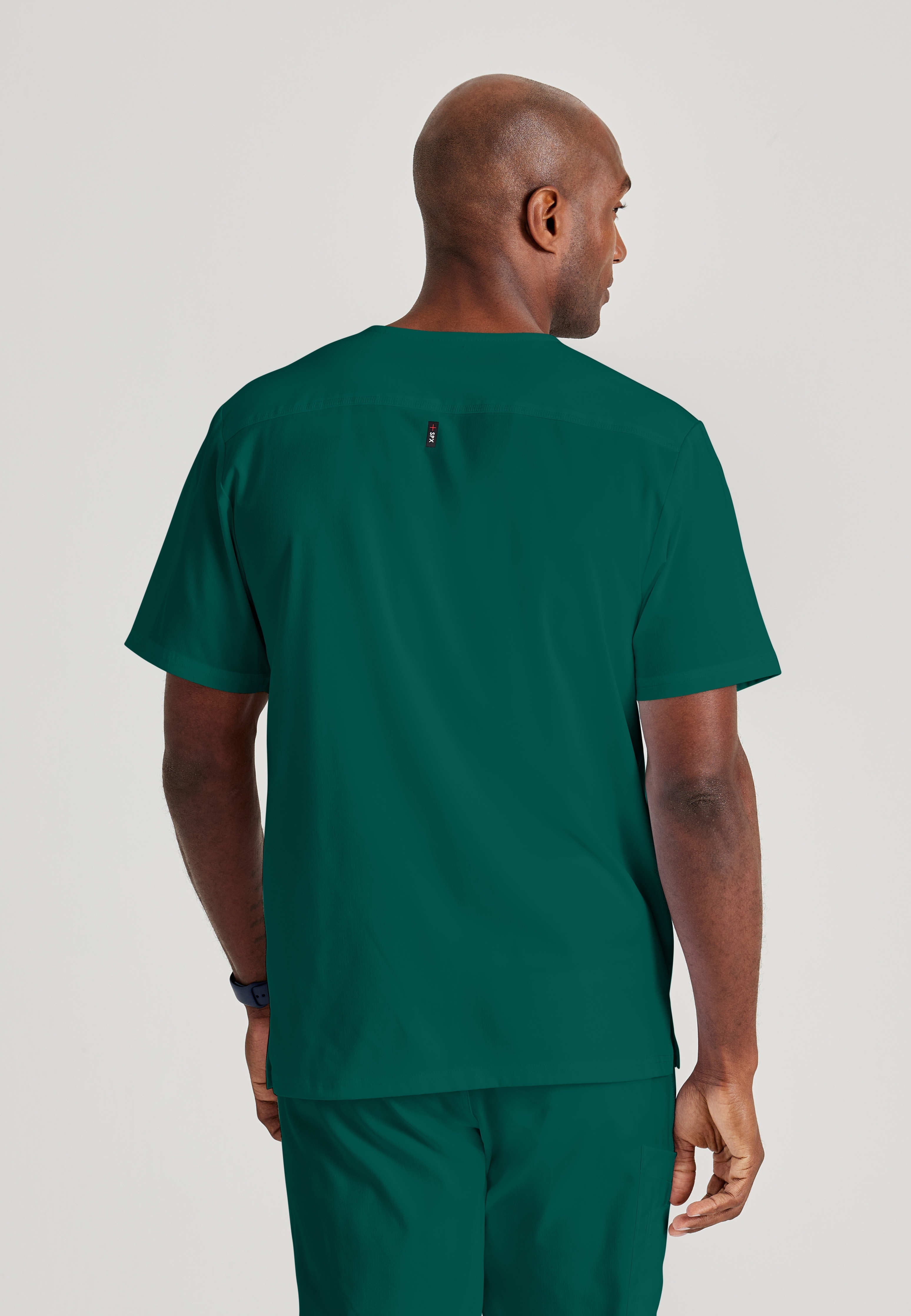 Grey's Anatomy Spandex-Stretch Men’s hunter green Chest Pocket V-Neck Scrub Top. Bungee loop. Soft stretch fabric wicks moisture. 