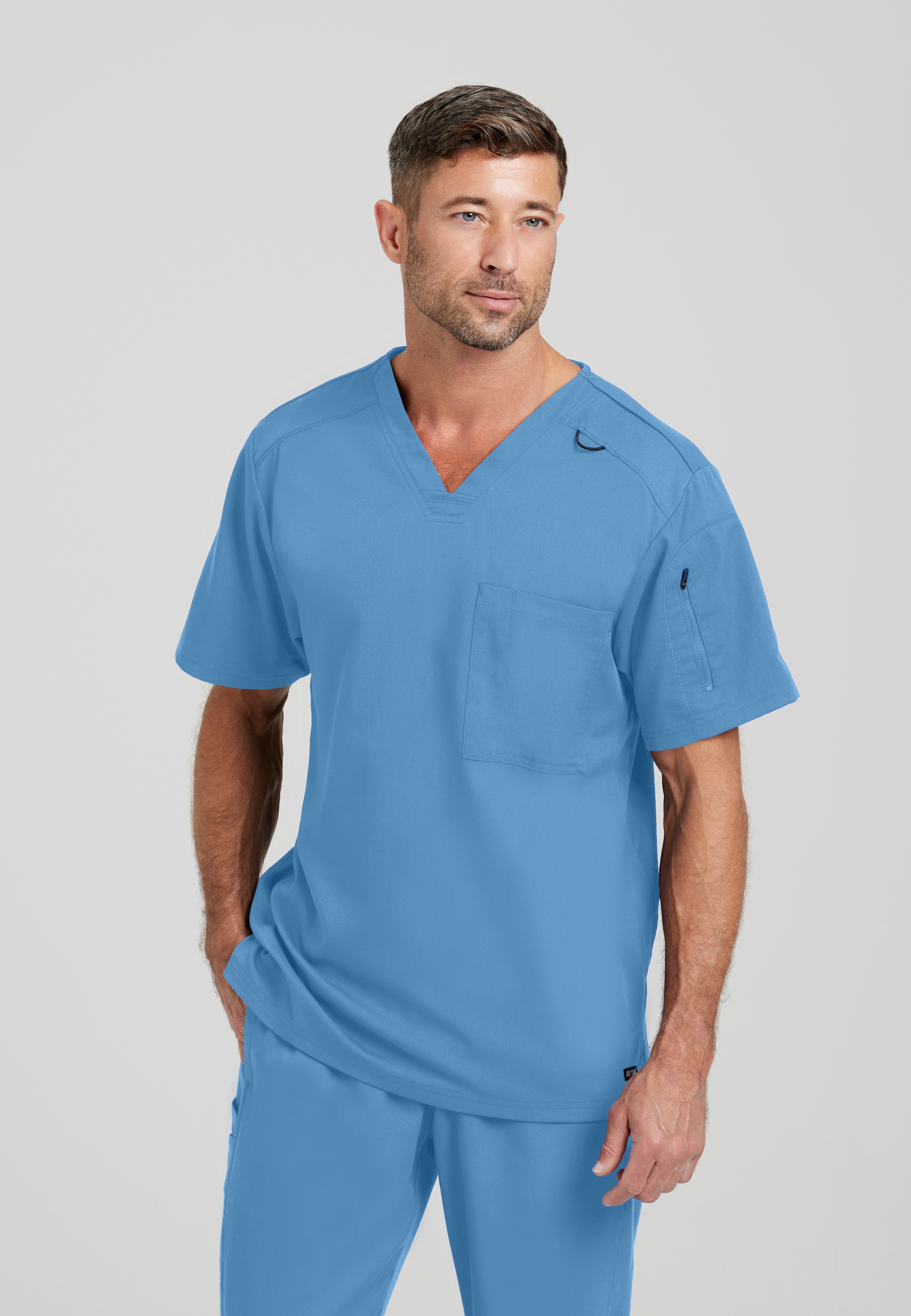 Front View of the Murphy 2-Pocket V-Neck Scrub Top in Ciel Blue from Grey's Anatomy™ by Barco Spandex Stretch