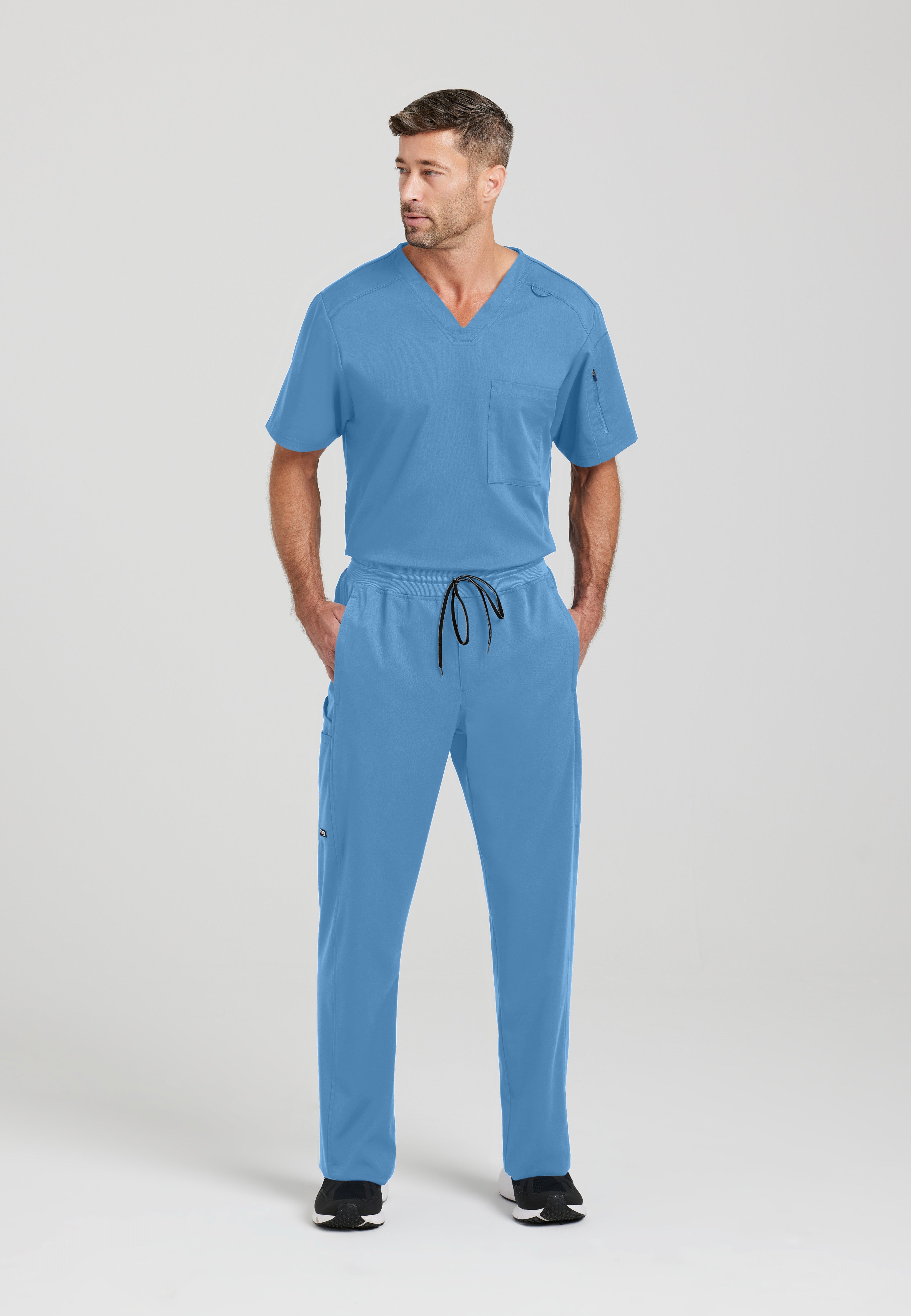 Full Body View of the Murphy 2-Pocket V-Neck Scrub Top in Ciel Blue from Grey's Anatomy™ by Barco Spandex Stretch