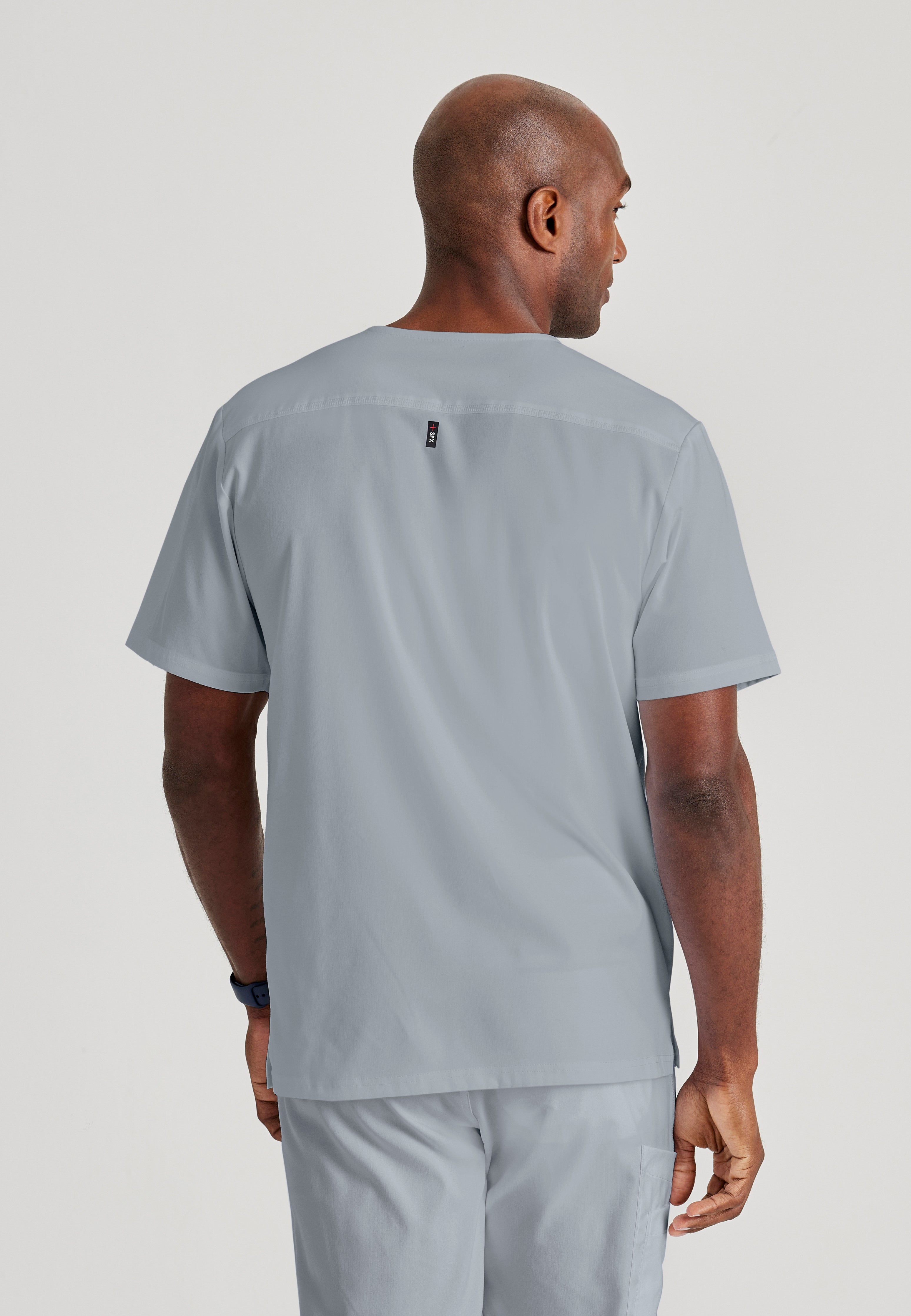 Side View of the Murphy 2-Pocket V-Neck Scrub Top in Moonstruck from Grey's Anatomy™ by Barco Spandex Stretch